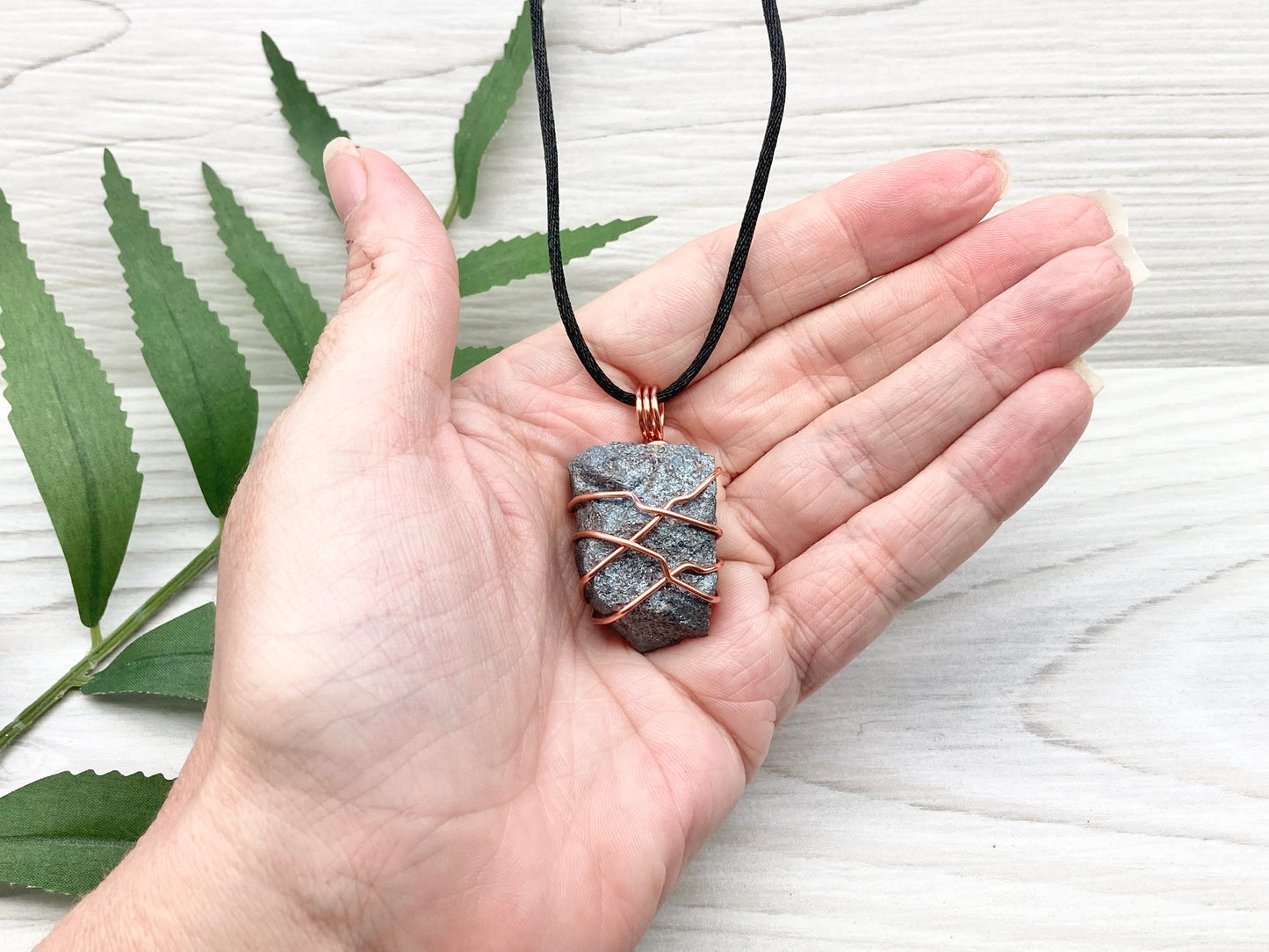 Raw Hematite Necklace. Gray Metallic Colored Stone Hand Wrapped With Pure Copper Wire. Comes On A Black Chain. New Age Jewelry For Him Or Her. Aquarius Zodiac Gemstone.