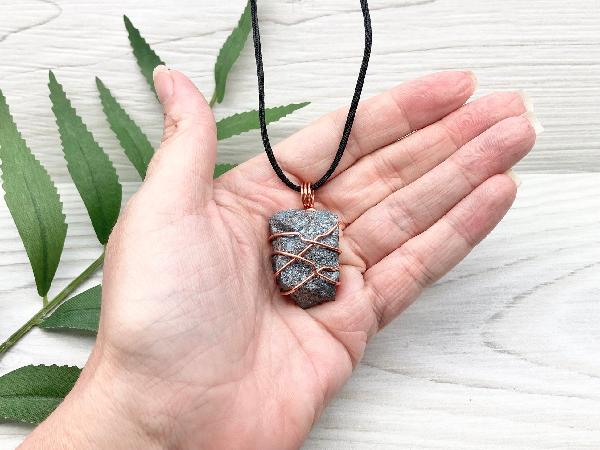 Raw Hematite Necklace. Gray Metallic Colored Stone Hand Wrapped With Pure Copper Wire. Comes On A Black Chain. New Age Jewelry For Him Or Her. Aquarius Zodiac Gemstone.