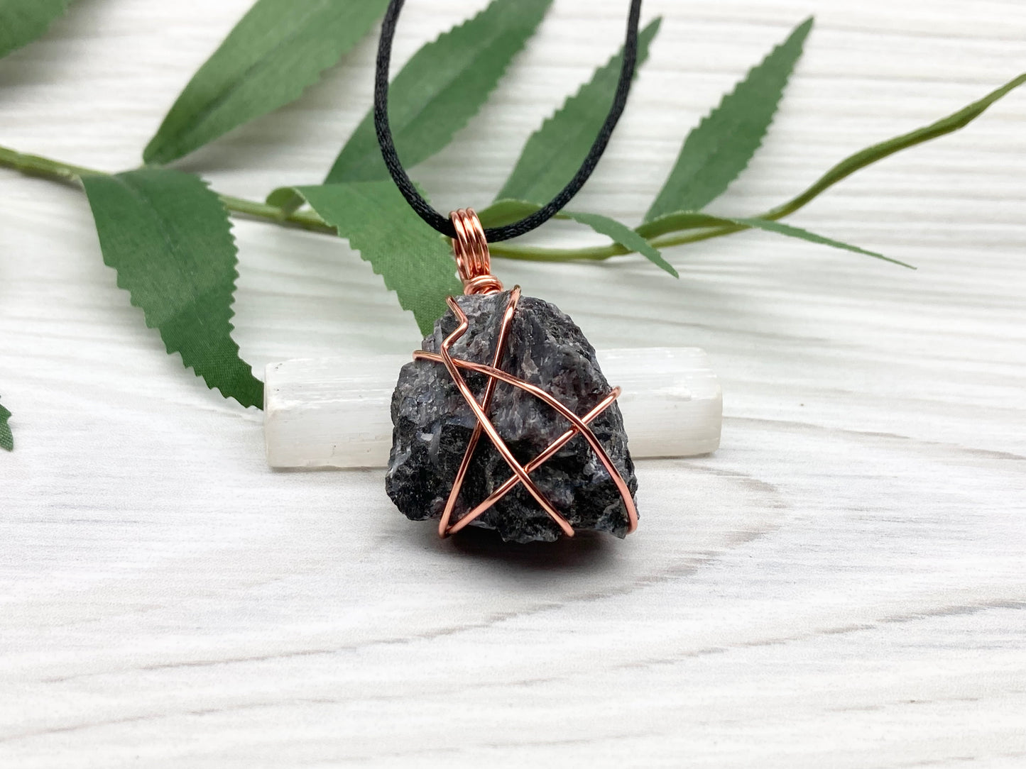 Indigo Gabbro Stone Necklace. Indigo Gabbro Crystal Wrapped With Tarnish Resistant Copper Wire. Also Known As Mystic Merlinite. Comes On A Black Chain. 
