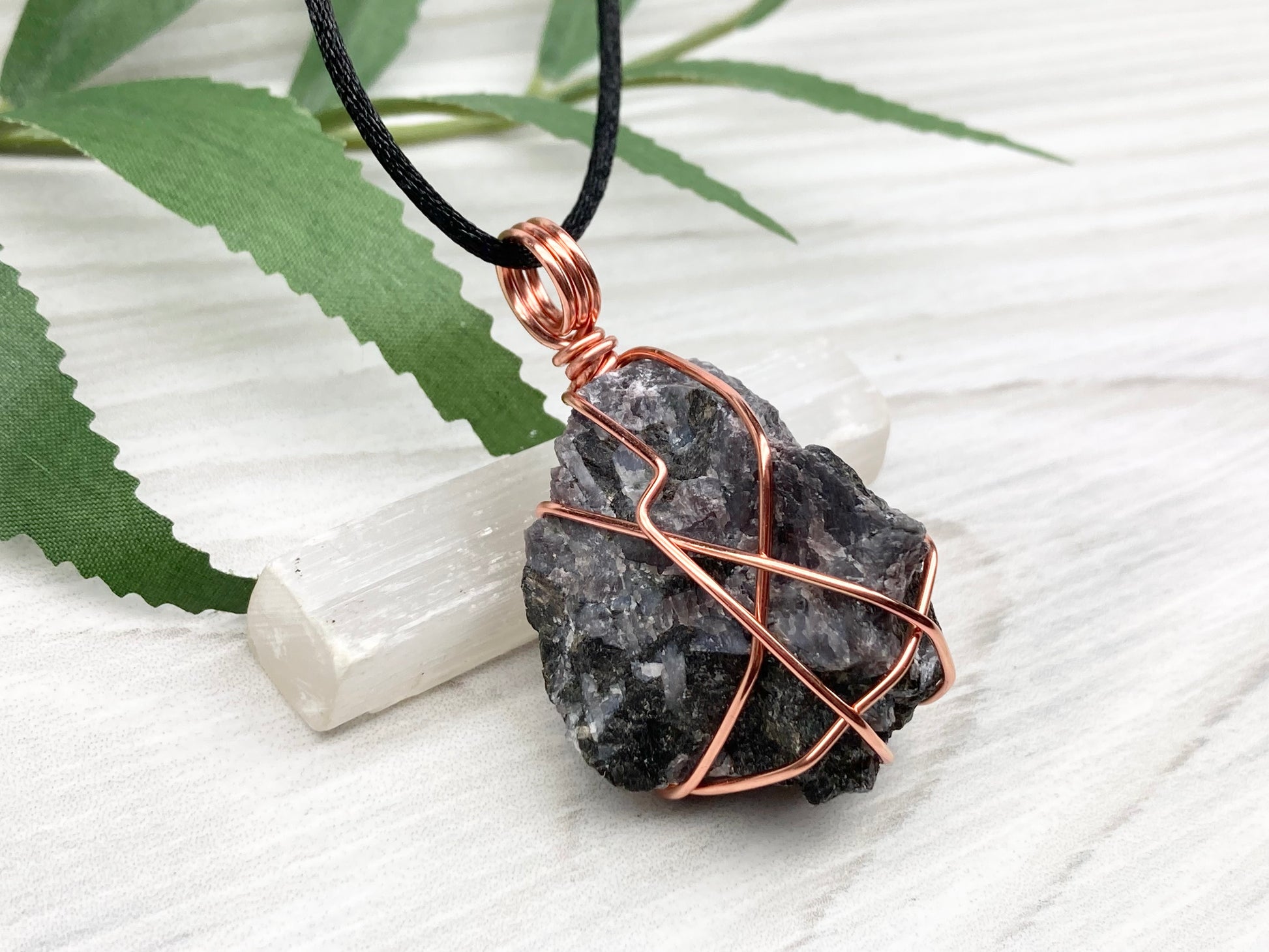 Indigo Gabbro Stone Necklace. Indigo Gabbro Crystal Wrapped With Tarnish Resistant Copper Wire. Also Known As Mystic Merlinite. Comes On A Black Chain. 