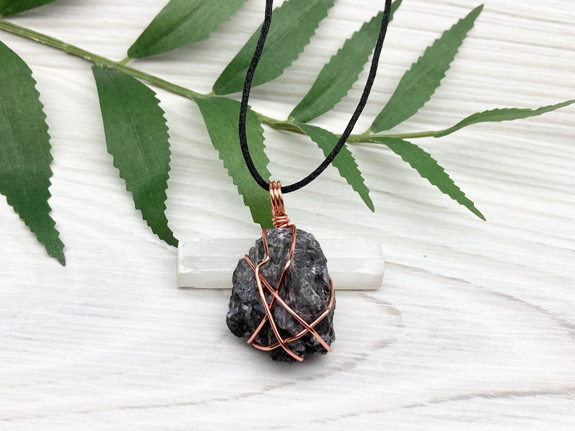 Indigo Gabbro Stone Necklace. Indigo Gabbro Crystal Wrapped With Tarnish Resistant Copper Wire. Also Known As Mystic Merlinite. Comes On A Black Chain. 