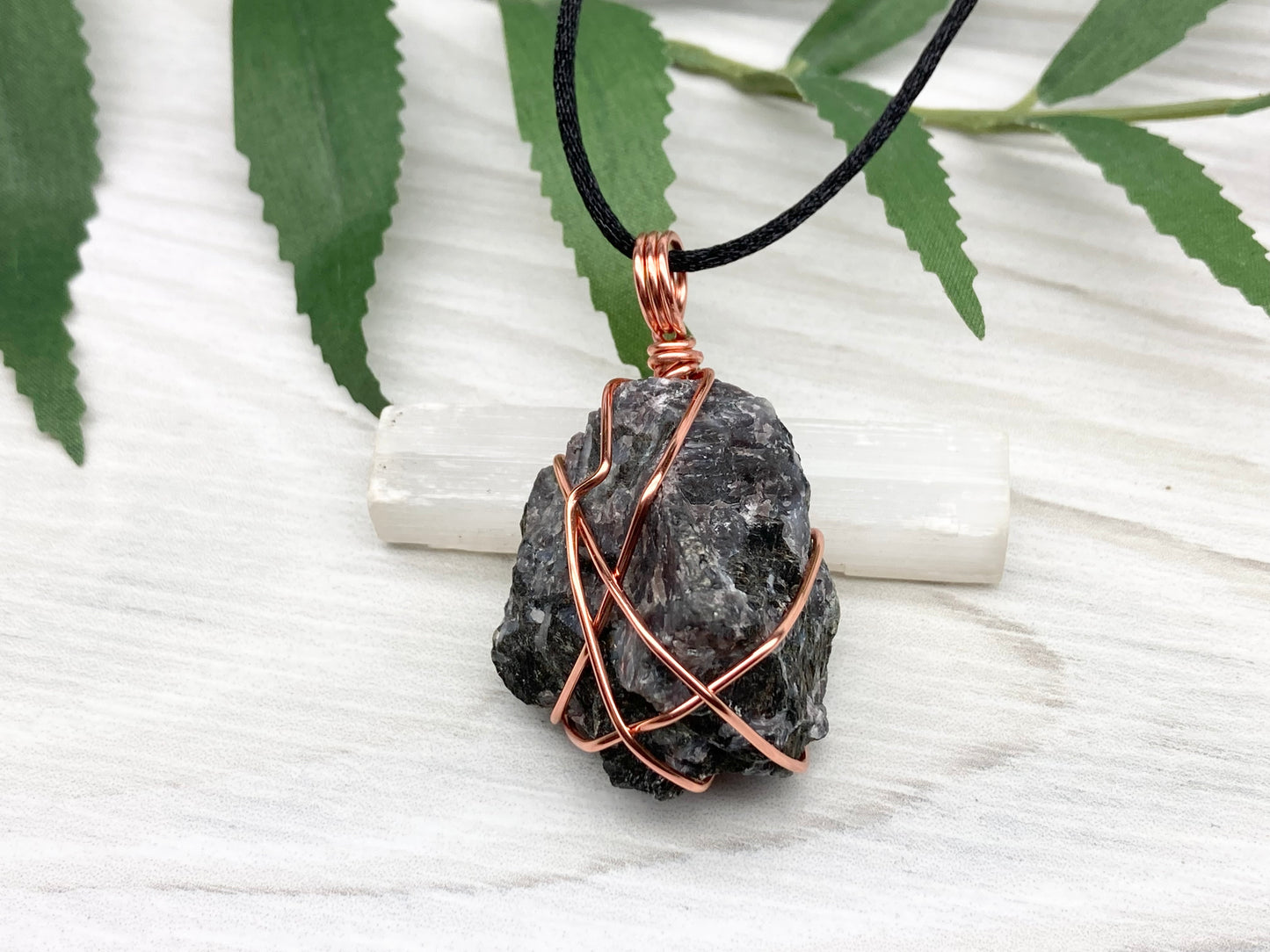 Indigo Gabbro Stone Necklace. Indigo Gabbro Crystal Wrapped With Tarnish Resistant Copper Wire. Also Known As Mystic Merlinite. Comes On A Black Chain. 