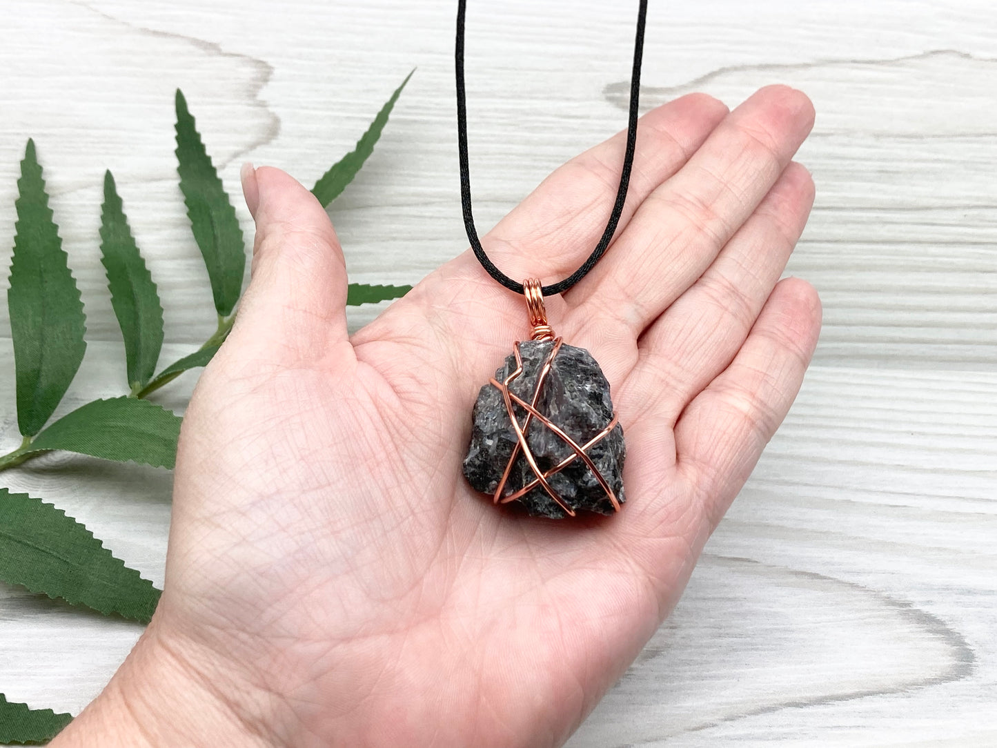 Indigo Gabbro Stone Necklace. Indigo Gabbro Crystal Wrapped With Tarnish Resistant Copper Wire. Also Known As Mystic Merlinite. Comes On A Black Chain. 