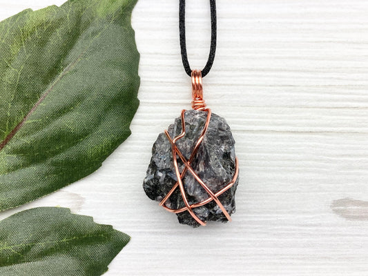 Indigo Gabbro Stone Necklace. Indigo Gabbro Crystal Wrapped With Tarnish Resistant Copper Wire. Also Known As Mystic Merlinite. Comes On A Black Chain. 
