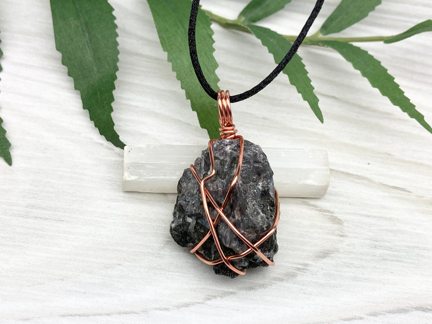 Indigo Gabbro Stone Necklace. Indigo Gabbro Crystal Wrapped With Tarnish Resistant Copper Wire. Also Known As Mystic Merlinite. Comes On A Black Chain. 