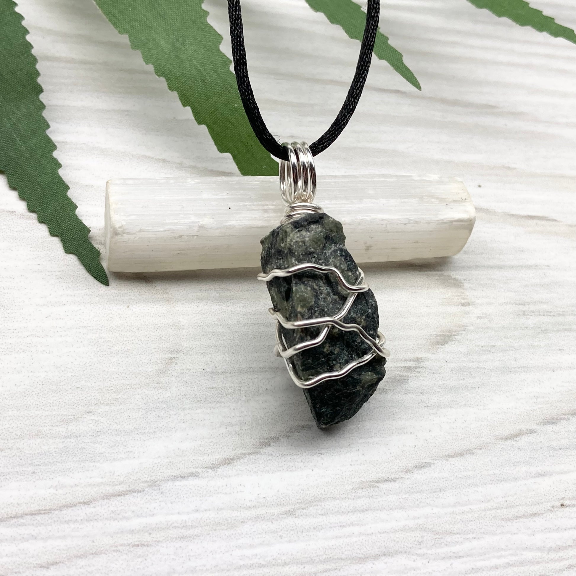 Kambaba Jasper necklace. Raw Kambaba Jasper stone wrapped with silver colored copper wire. Hangs on a black satin silk chain. Wire wrapped green and black crystal  copper pendant. Handcrafted metaphysical jewelry.