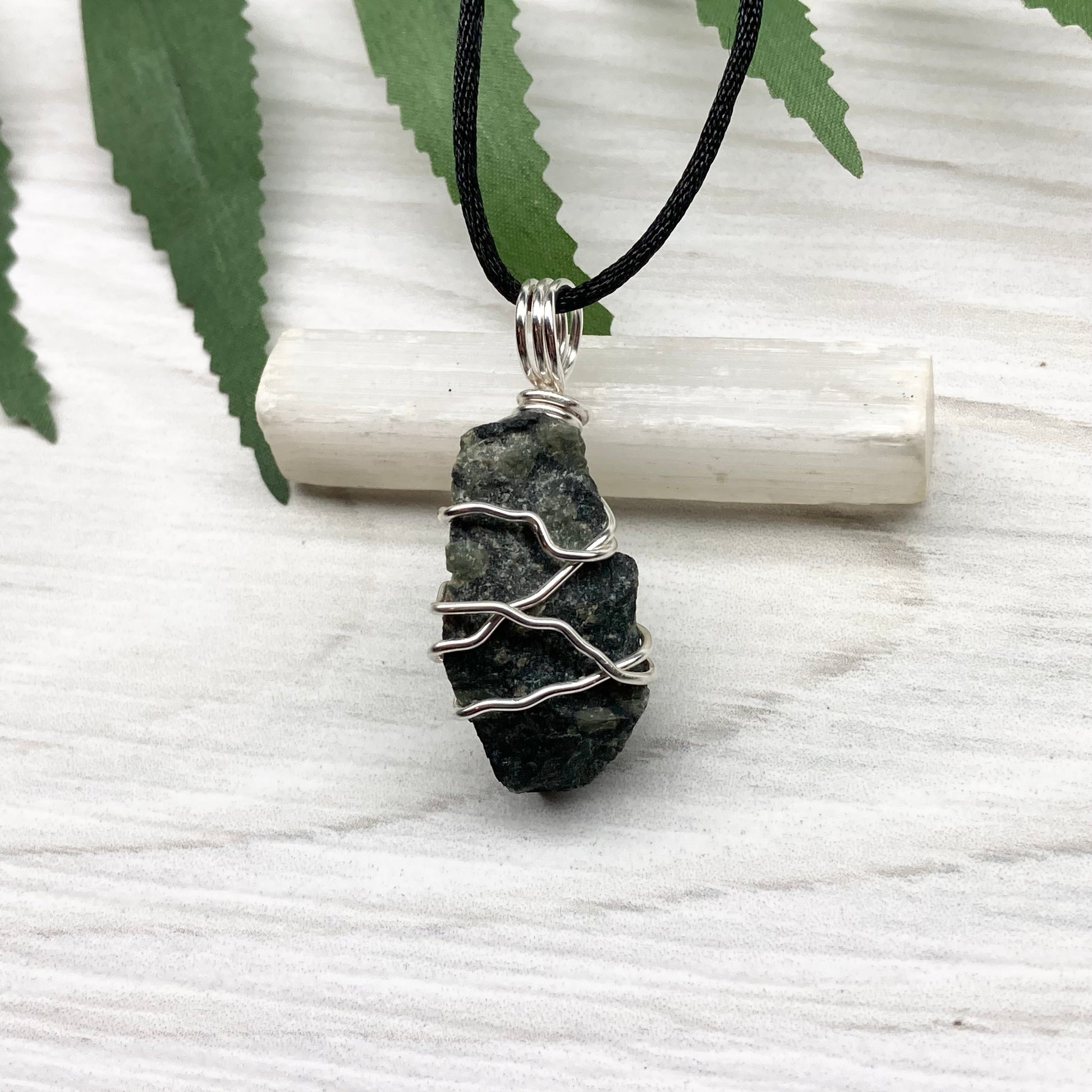 Kambaba Jasper necklace. Raw Kambaba Jasper stone wrapped with silver colored copper wire. Hangs on a black satin silk chain. Wire wrapped green and black crystal  copper pendant. Handcrafted metaphysical jewelry.