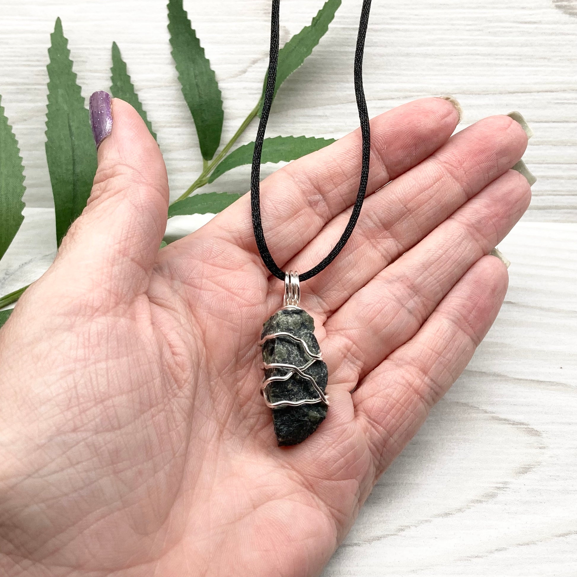 Kambaba Jasper necklace. Raw Kambaba Jasper stone wrapped with silver colored copper wire. Hangs on a black satin silk chain. Wire wrapped green and black crystal  copper pendant. Handcrafted metaphysical jewelry.