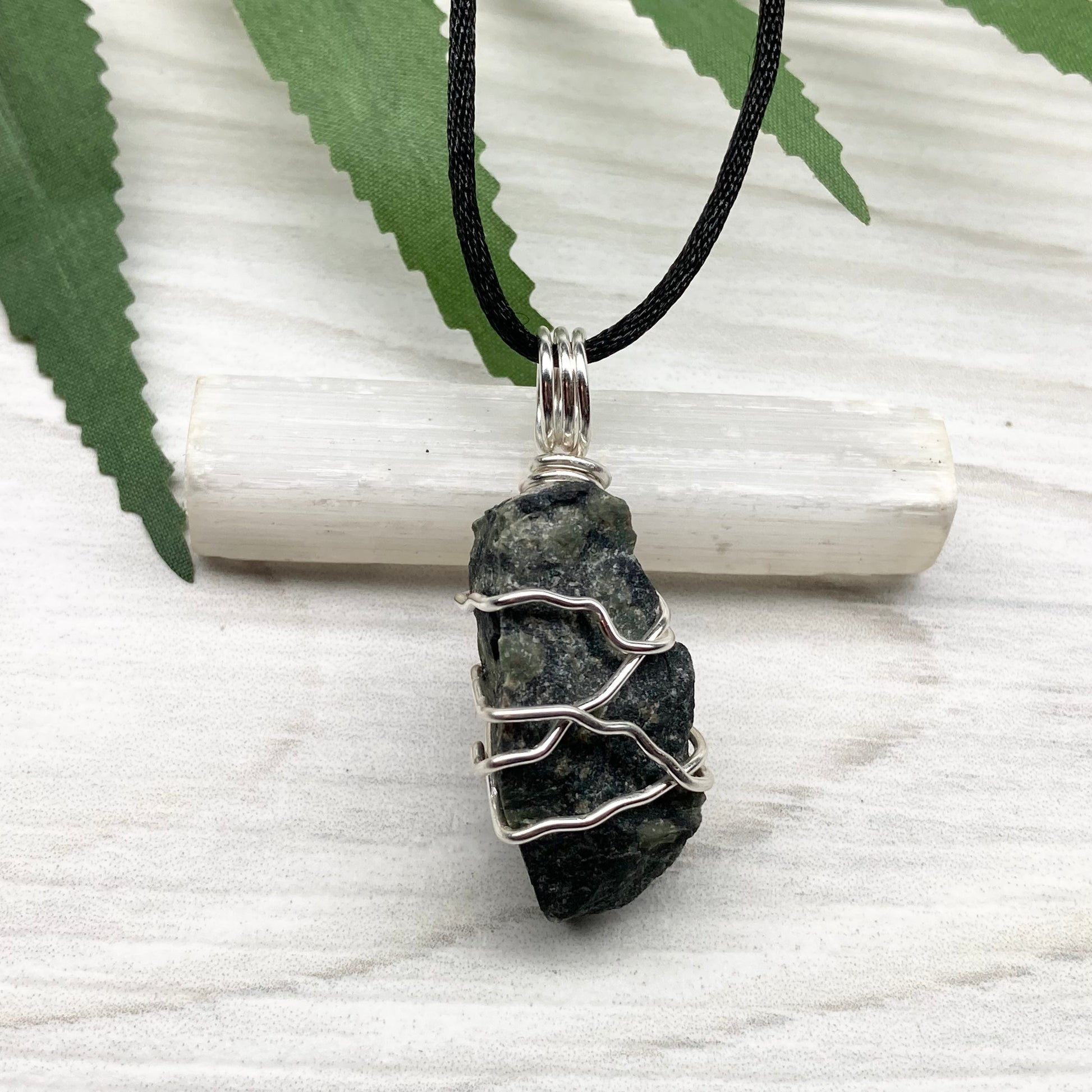 Kambaba Jasper necklace. Raw Kambaba Jasper stone wrapped with silver colored copper wire. Hangs on a black satin silk chain. Wire wrapped green and black crystal  copper pendant. Handcrafted metaphysical jewelry.