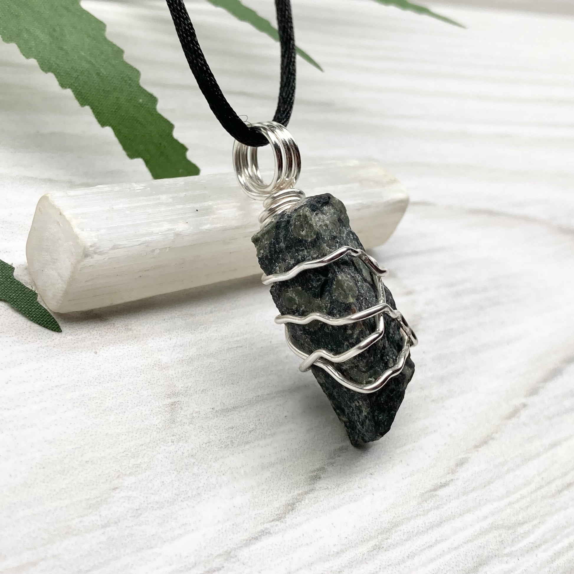 Kambaba Jasper necklace. Raw Kambaba Jasper stone wrapped with silver colored copper wire. Hangs on a black satin silk chain. Wire wrapped green and black crystal  copper pendant. Handcrafted metaphysical jewelry.