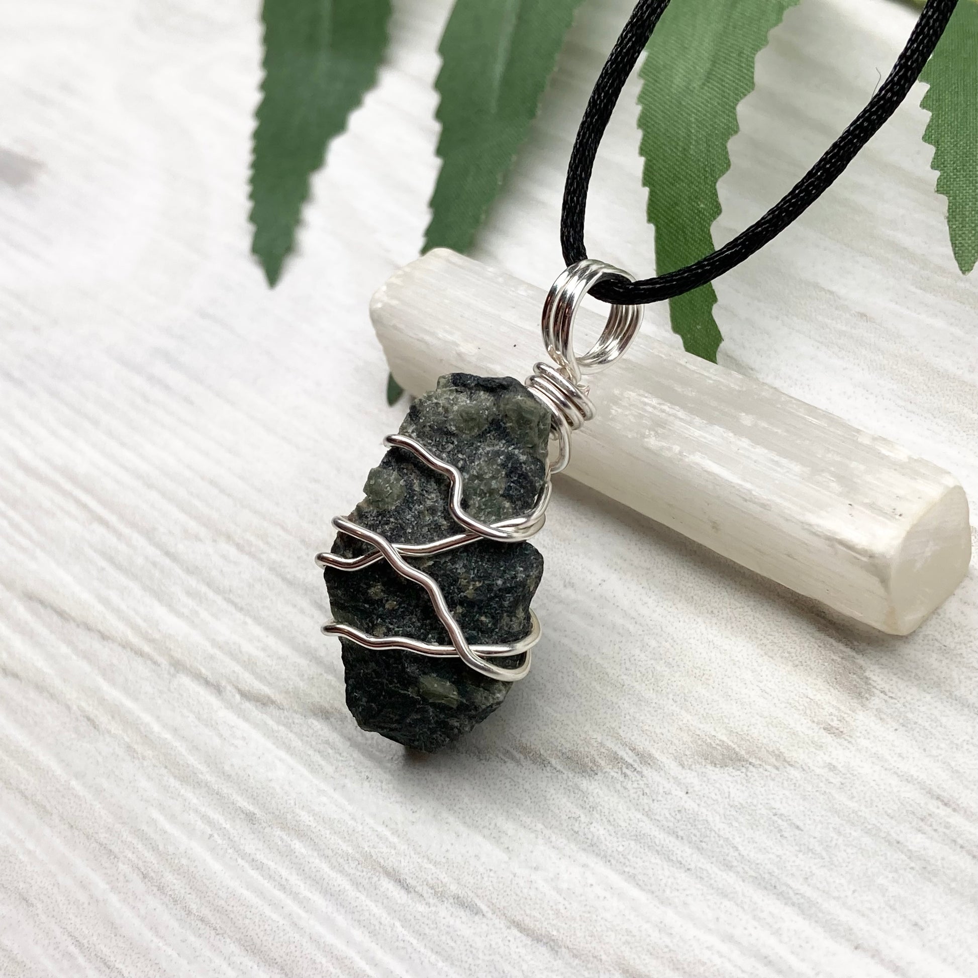 Kambaba Jasper necklace. Raw Kambaba Jasper stone wrapped with silver colored copper wire. Hangs on a black satin silk chain. Wire wrapped green and black crystal  copper pendant. Handcrafted metaphysical jewelry.