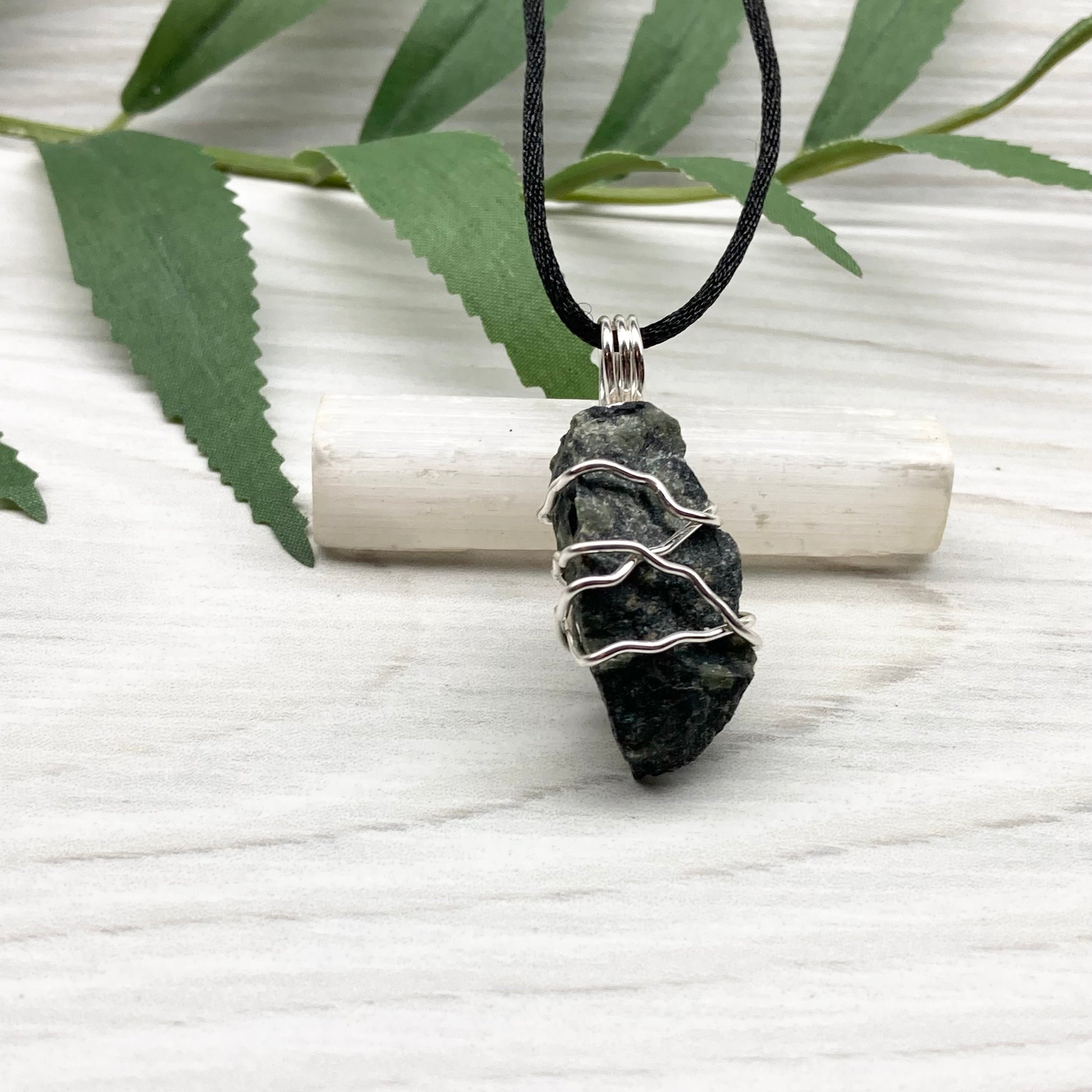 Kambaba Jasper necklace. Raw Kambaba Jasper stone wrapped with silver colored copper wire. Hangs on a black satin silk chain. Wire wrapped green and black crystal  copper pendant. Handcrafted metaphysical jewelry.