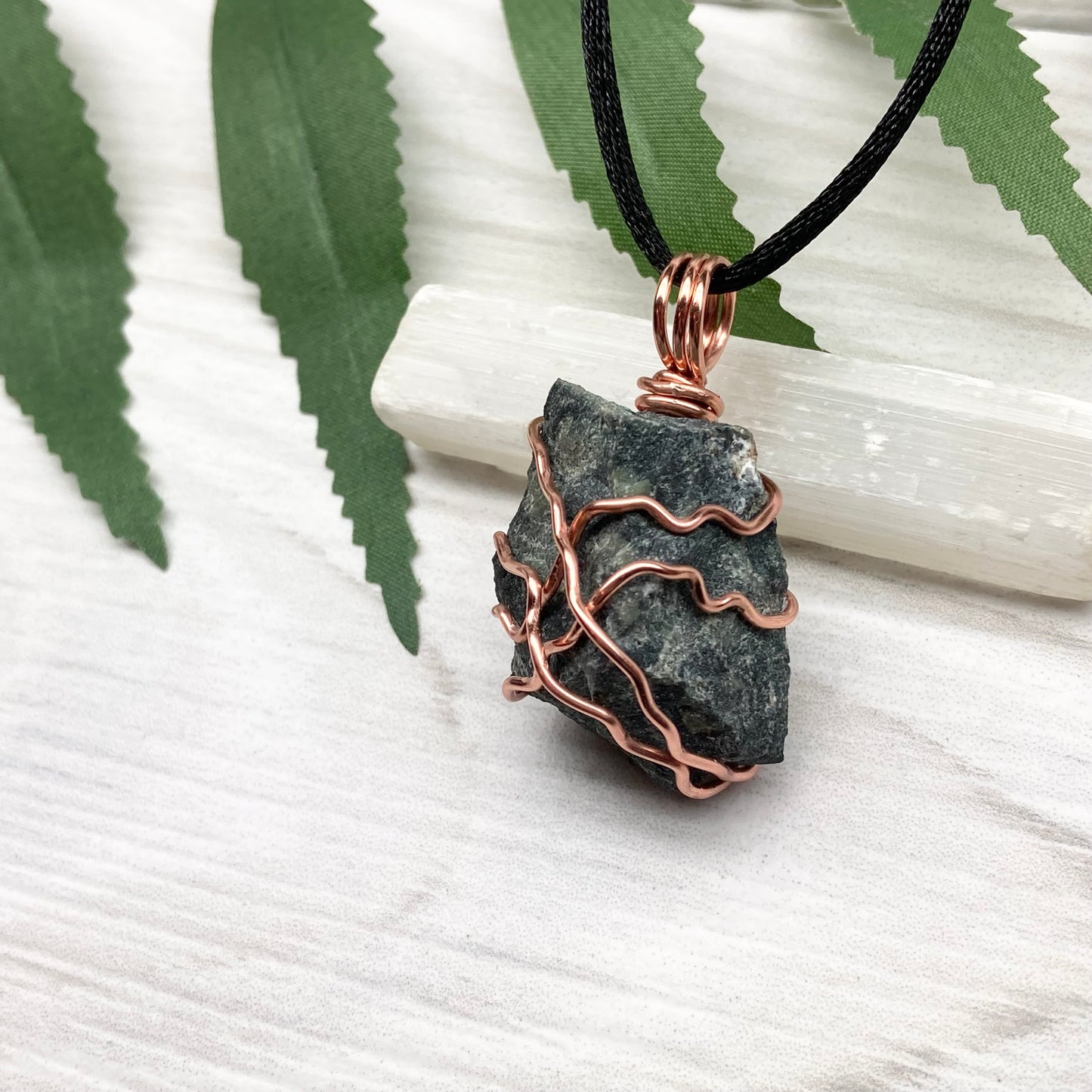Raw Kambaba Jasper Necklace. Black and green stone wrapped with tarnish resistant copper wire. Comes on a black chain. Real crystal pendant. Wire wrapped jewelry. Handmade witchy gift.