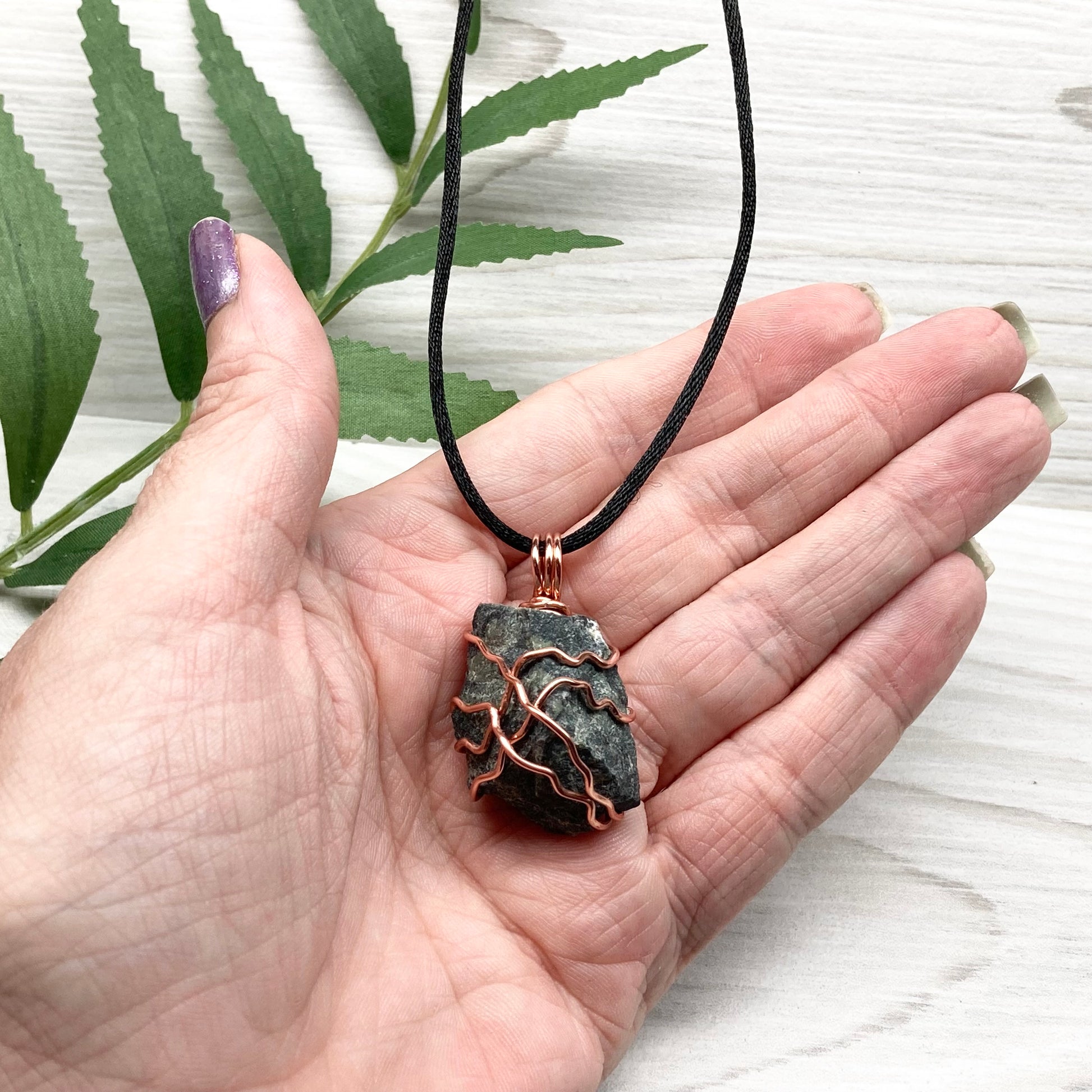 Raw Kambaba Jasper Necklace. Black and green stone wrapped with tarnish resistant copper wire. Comes on a black chain. Real crystal pendant. Wire wrapped jewelry. Handmade witchy gift.