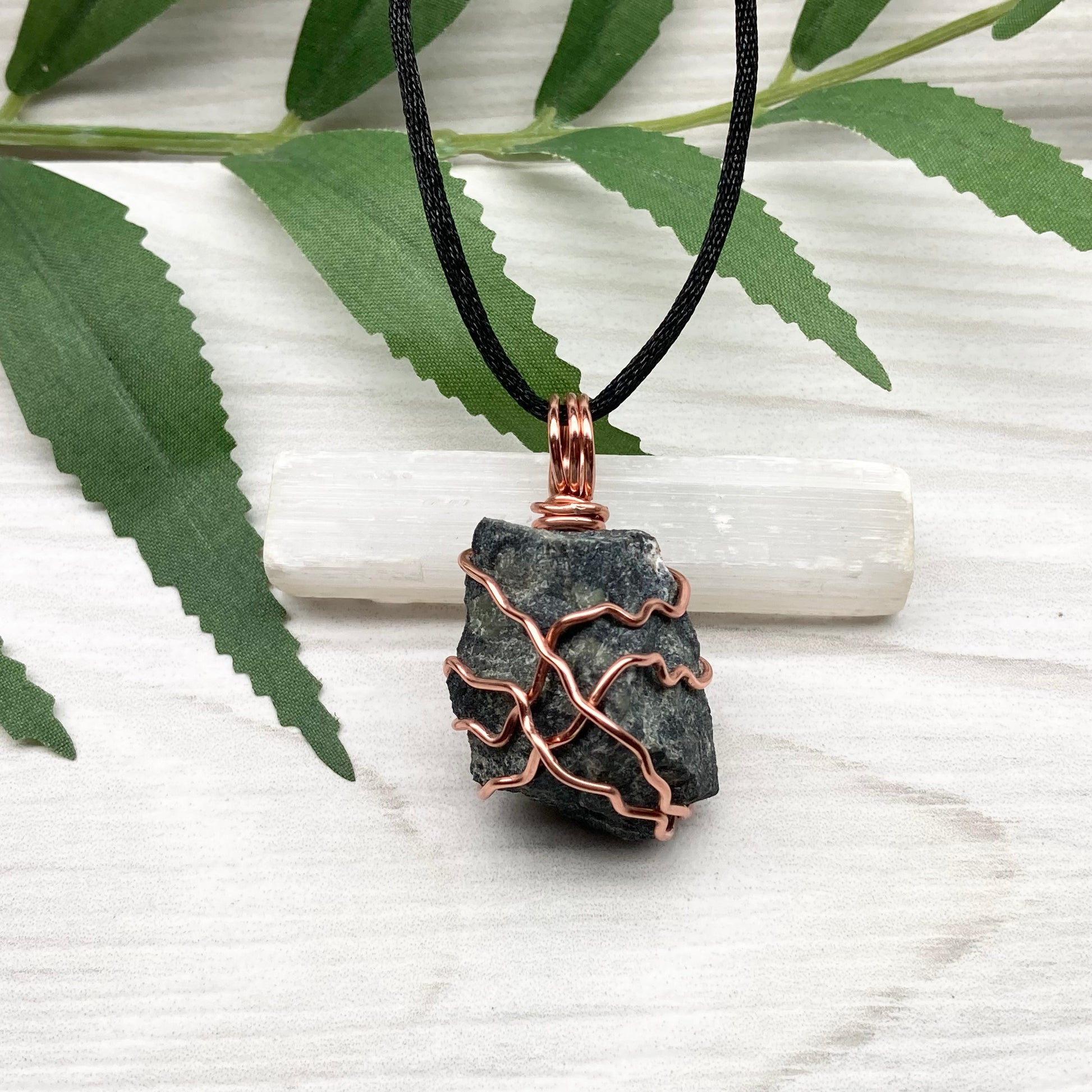 Raw Kambaba Jasper Necklace. Black and green stone wrapped with tarnish resistant copper wire. Comes on a black chain. Real crystal pendant. Wire wrapped jewelry. Handmade witchy gift.