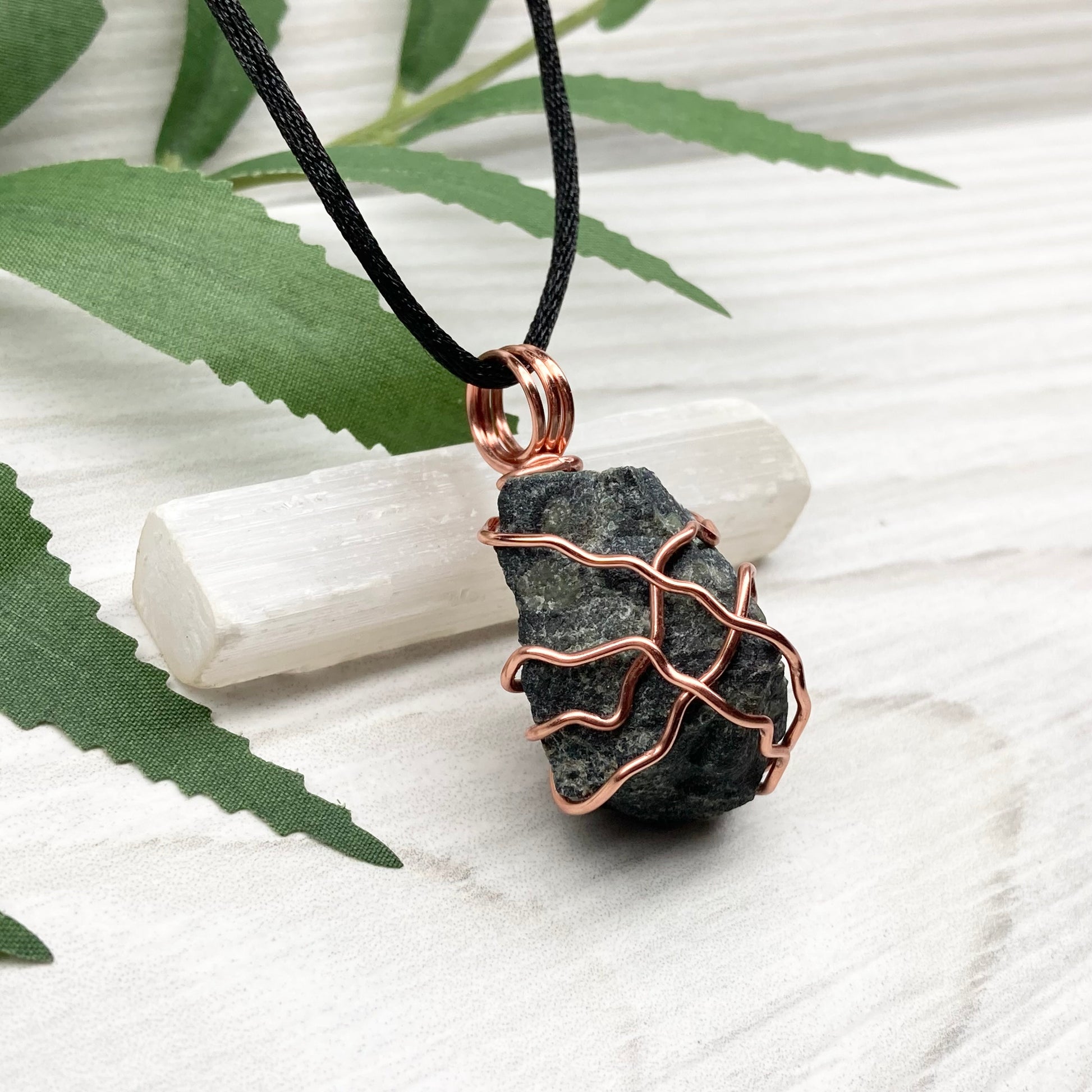 Raw Kambaba Jasper Necklace. Black and green stone wrapped with tarnish resistant copper wire. Comes on a black chain. Real crystal pendant. Wire wrapped jewelry. Handmade witchy gift.
