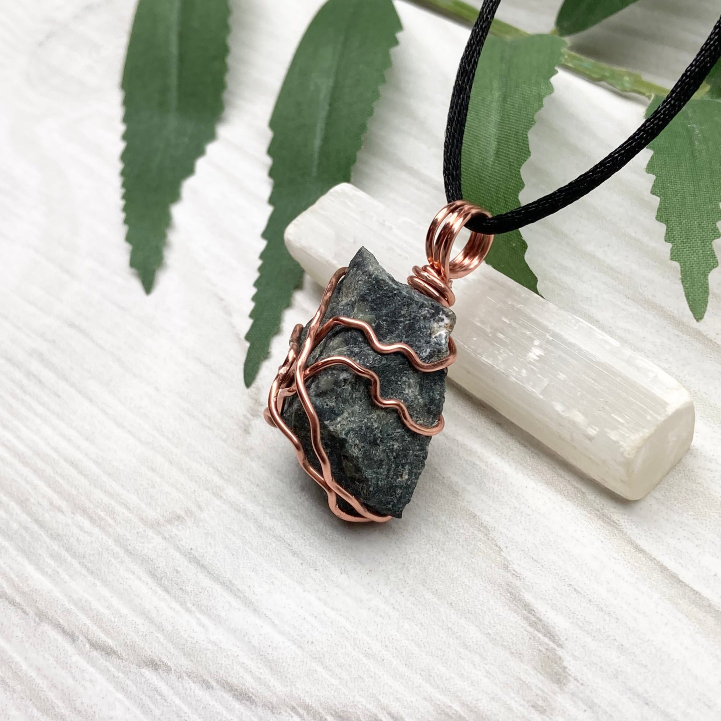 Raw Kambaba Jasper Necklace. Black and green stone wrapped with tarnish resistant copper wire. Comes on a black chain. Real crystal pendant. Wire wrapped jewelry. Handmade witchy gift.
