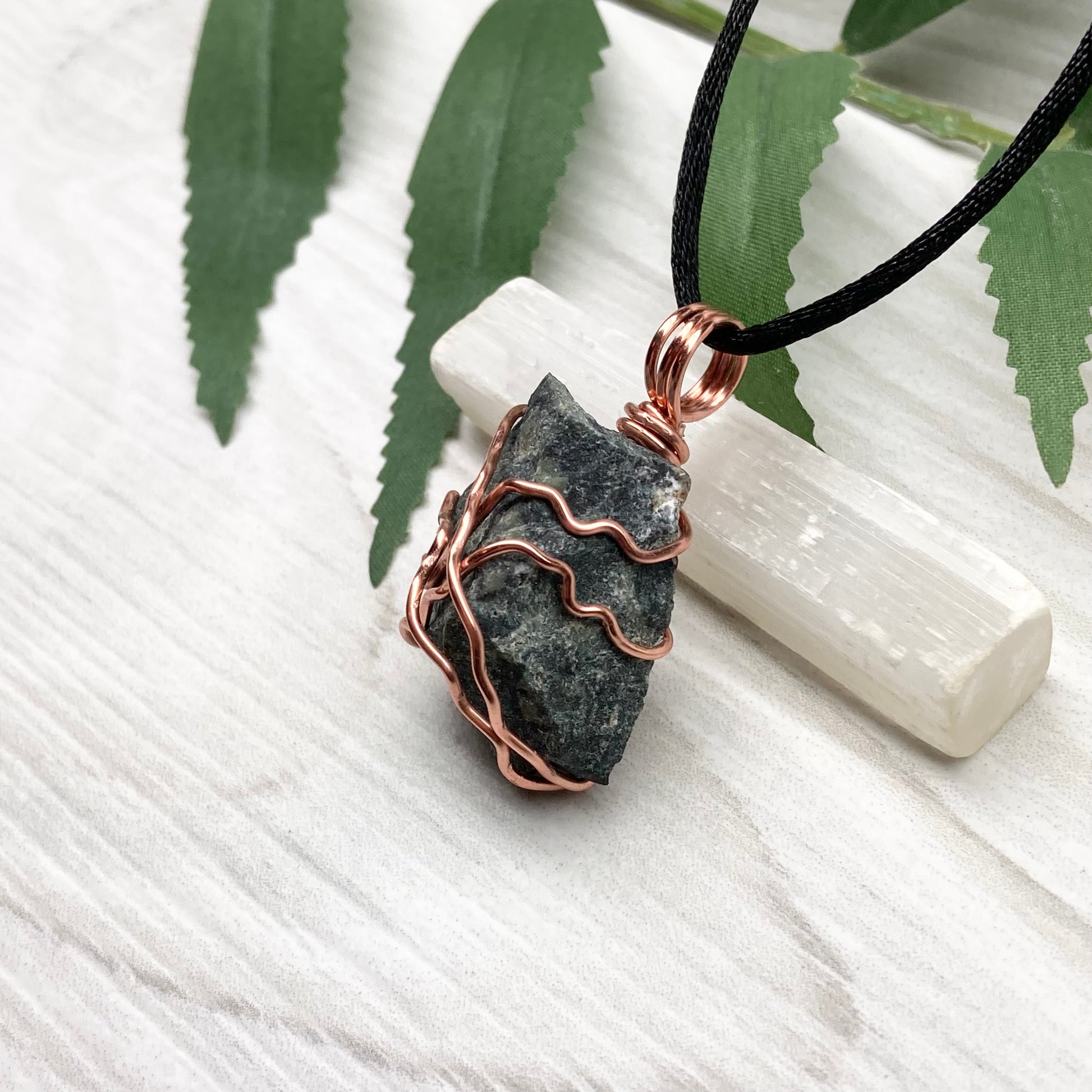 Raw Kambaba Jasper Necklace. Black and green stone wrapped with tarnish resistant copper wire. Comes on a black chain. Real crystal pendant. Wire wrapped jewelry. Handmade witchy gift.