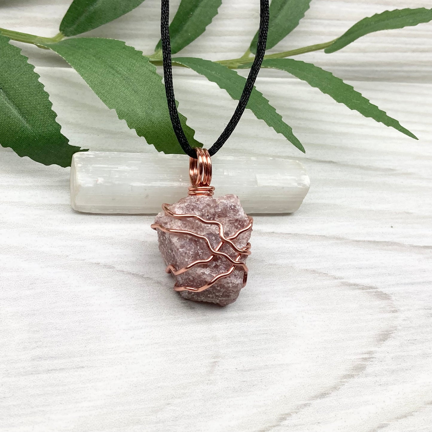 Pink Aventurine Necklace. Raw pink stone wrapped with tarnish resistant copper wire. Comes on a black chain. Wire wrapped crystal pendant. Heart chakra Jewelry. 