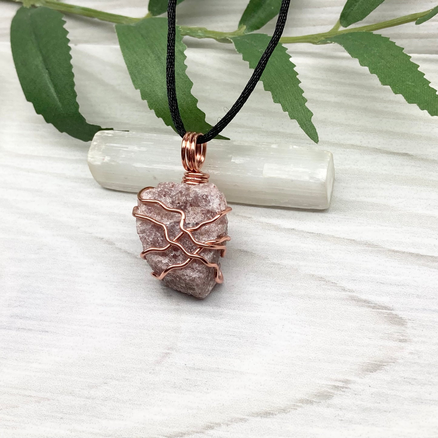 Pink Aventurine Necklace. Raw pink stone wrapped with tarnish resistant copper wire. Comes on a black chain. Wire wrapped crystal pendant. Heart chakra Jewelry. 