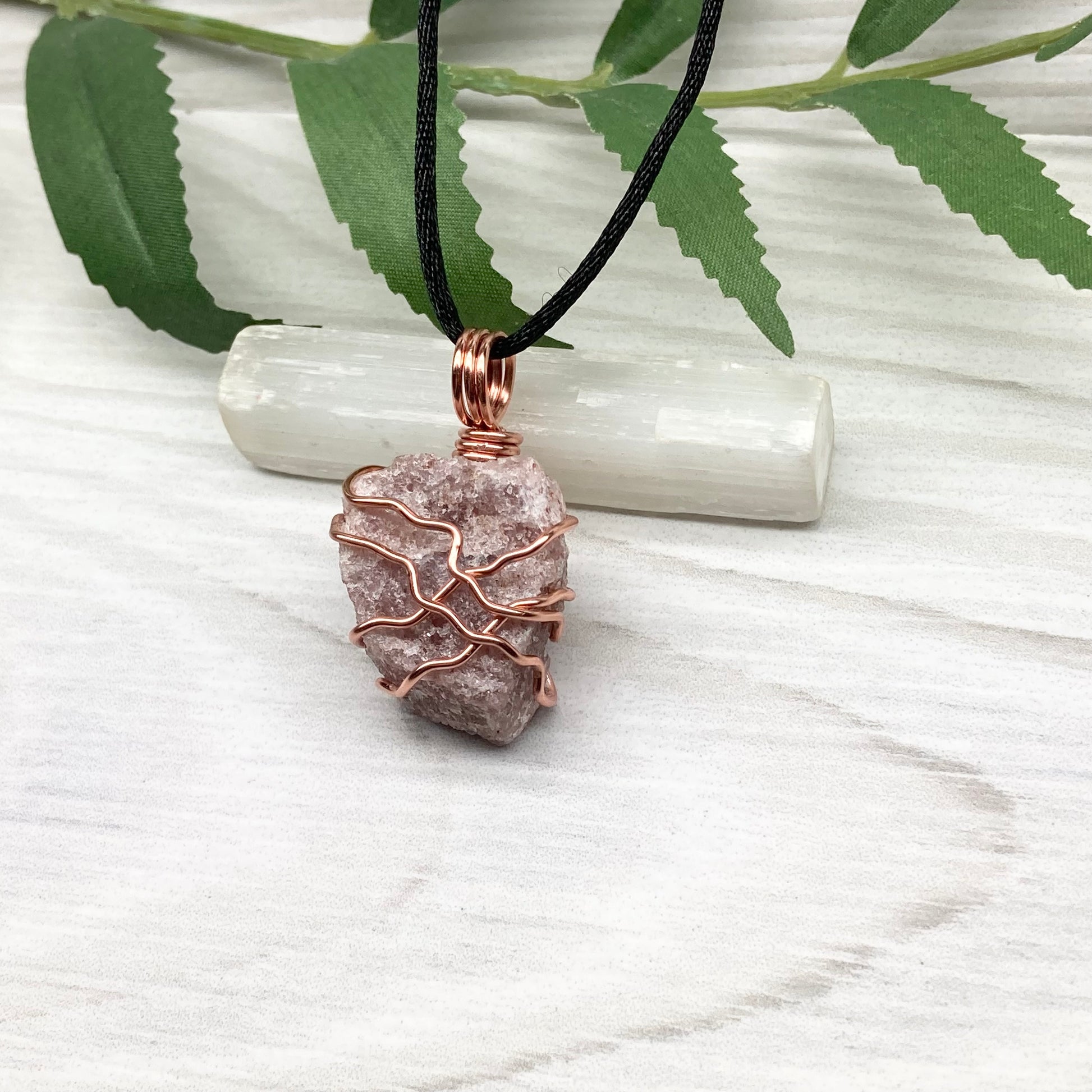 Pink Aventurine Necklace. Raw pink stone wrapped with tarnish resistant copper wire. Comes on a black chain. Wire wrapped crystal pendant. Heart chakra Jewelry. 