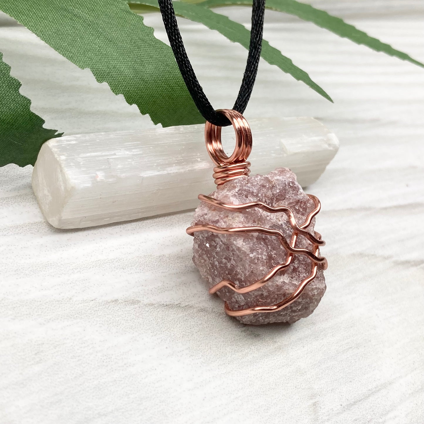 Pink Aventurine Necklace. Raw pink stone wrapped with tarnish resistant copper wire. Comes on a black chain. Wire wrapped crystal pendant. Heart chakra Jewelry. 