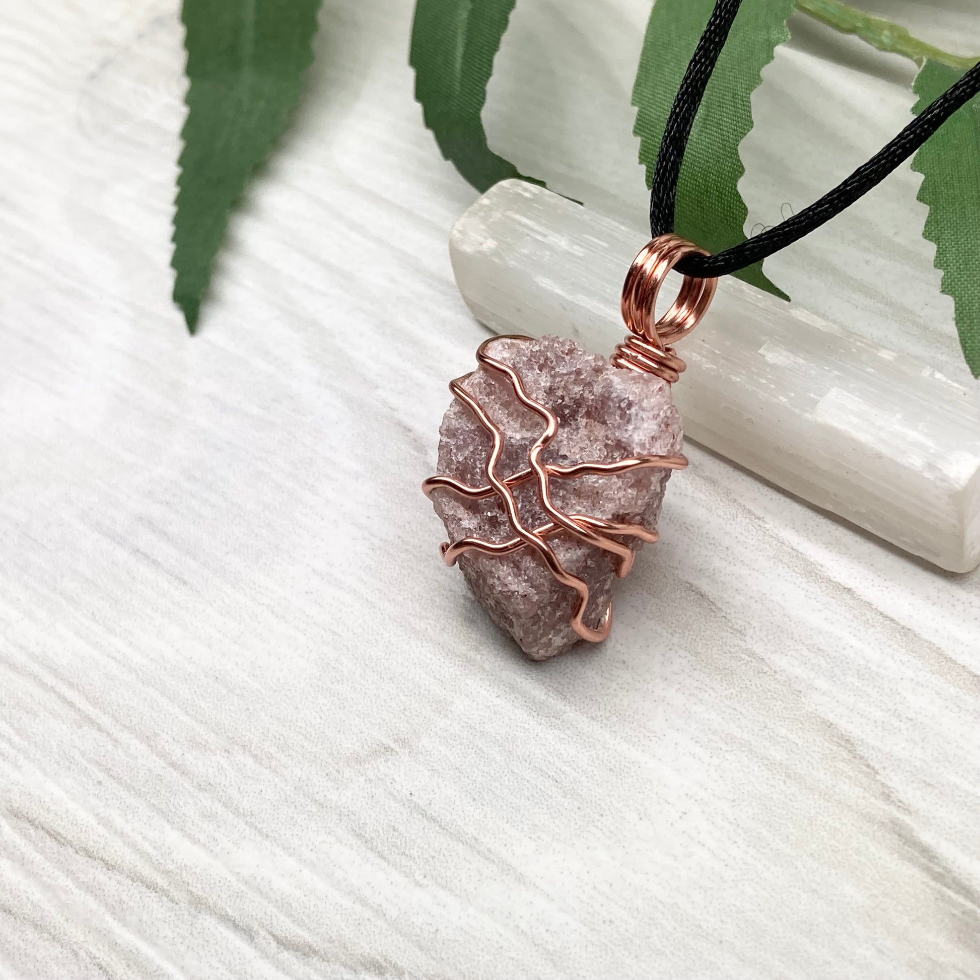 Pink Aventurine Necklace. Raw pink stone wrapped with tarnish resistant copper wire. Comes on a black chain. Wire wrapped crystal pendant. Heart chakra Jewelry. 