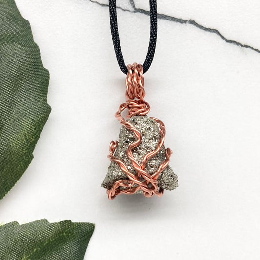 Raw Pyrite Necklace. Real Pyrite Stone Hand Wrapped With Copper Wire. Fools Gold Crystal Pendant. Comes On A Black Chain. Leo And Taurus Zodiac Jewelry. Handmade In Tennessee.
