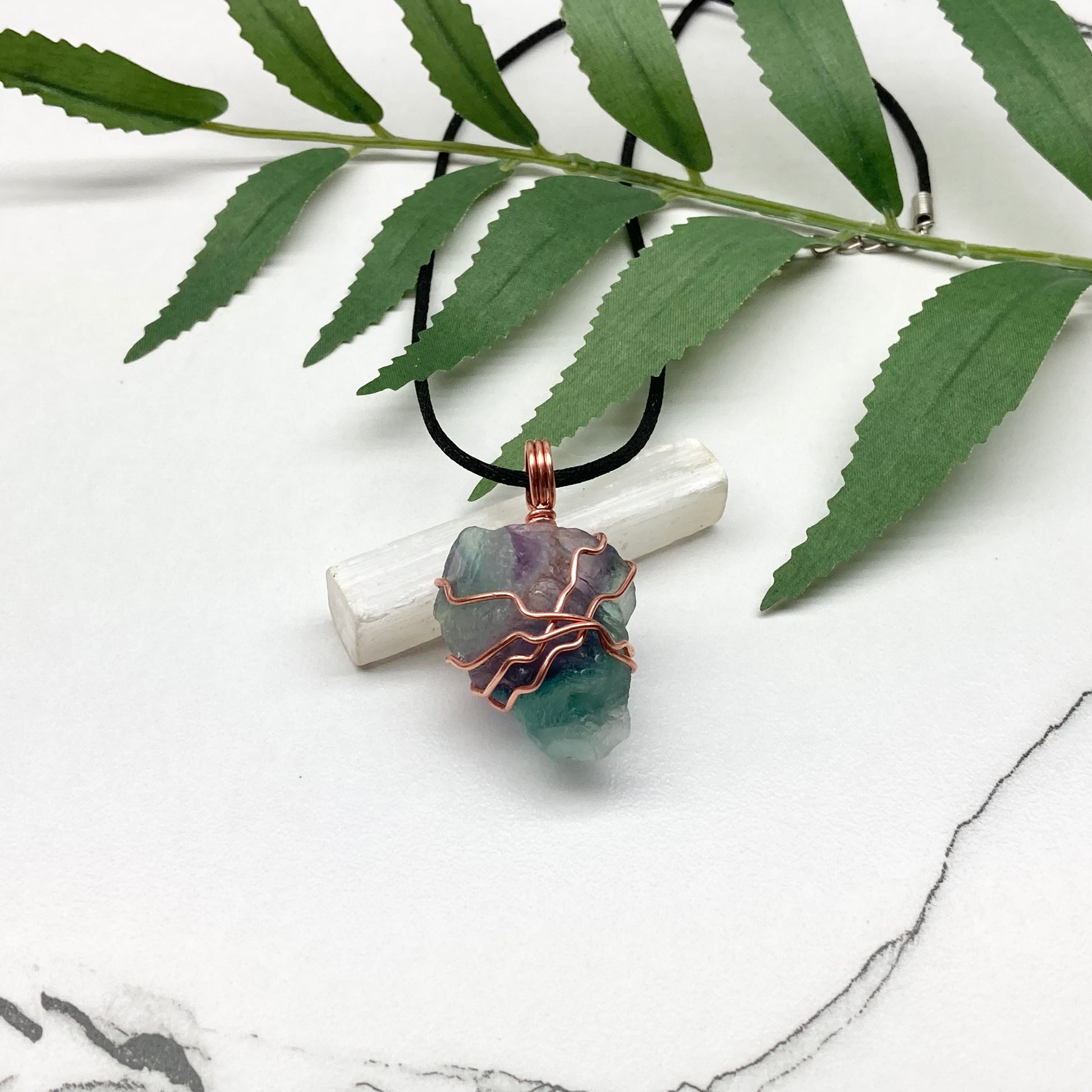 Rainbow Fluorite necklace. Green and purple Fluorite crystal wrapped with pure copper wire. Comes on a black chain. Wire wrapped stone pendant. Aquarius zodiac gift.