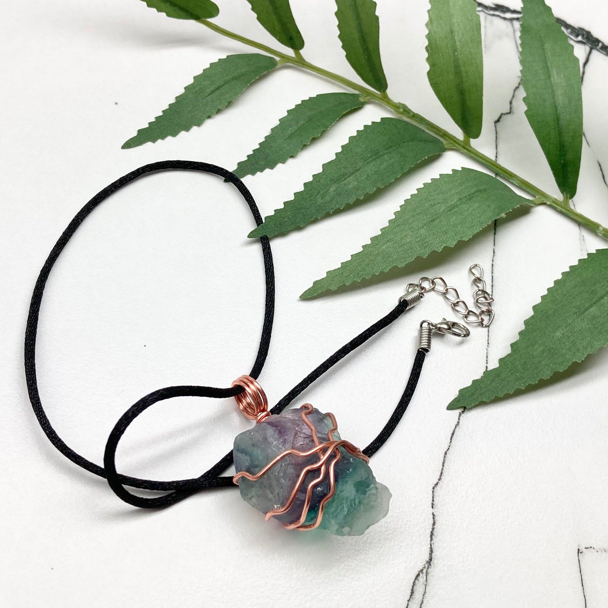 Rainbow Fluorite necklace. Green and purple Fluorite crystal wrapped with pure copper wire. Comes on a black chain. Wire wrapped stone pendant. Aquarius zodiac gift.
