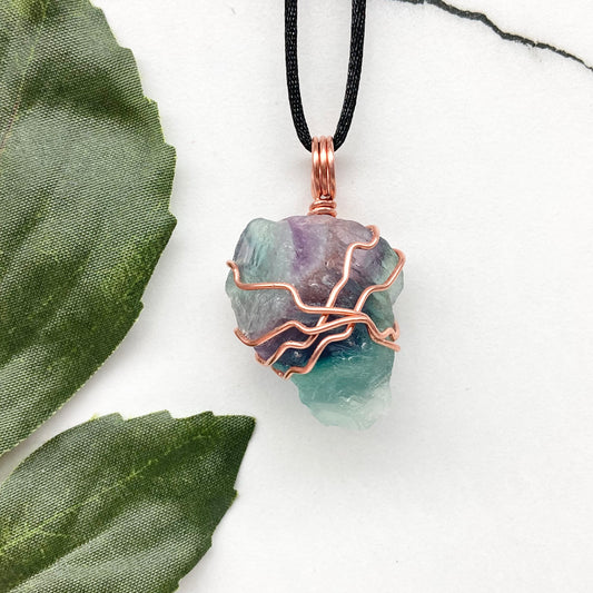 Rainbow Fluorite necklace. Green and purple Fluorite crystal wrapped with pure copper wire. Comes on a black chain. Wire wrapped stone pendant. Aquarius zodiac gift.