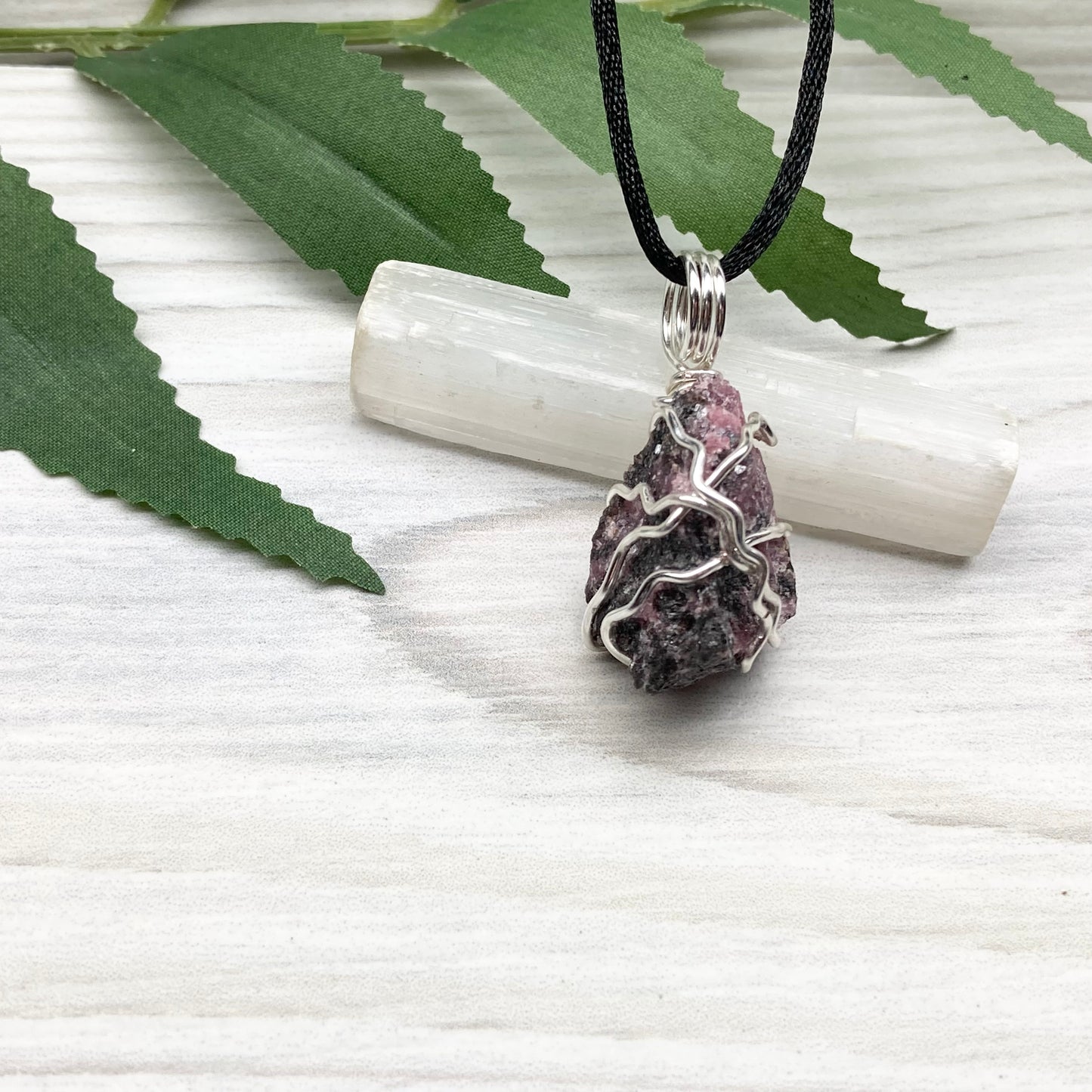 Rhodonite necklace. Raw Rhodonite wrapped with silver copper wire. Comes on a black chain. Black and pink crystal pendant. Wire wrapped stone jewelry. Taurus zodiac gift.