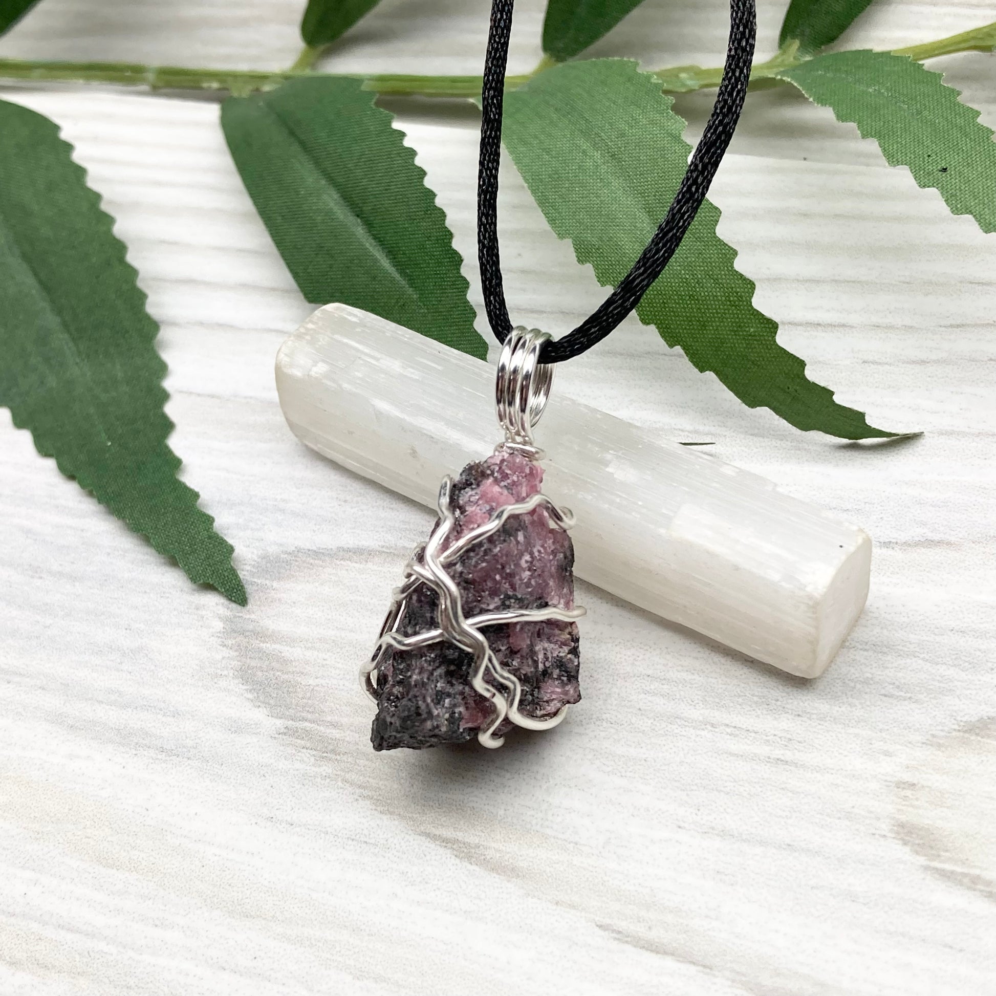 Rhodonite necklace. Raw Rhodonite wrapped with silver copper wire. Comes on a black chain. Black and pink crystal pendant. Wire wrapped stone jewelry. Taurus zodiac gift.