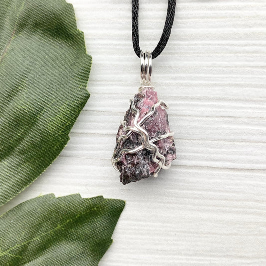 Rhodonite necklace. Raw Rhodonite wrapped with silver copper wire. Comes on a black chain. Black and pink crystal pendant. Wire wrapped stone jewelry. Taurus zodiac gift.