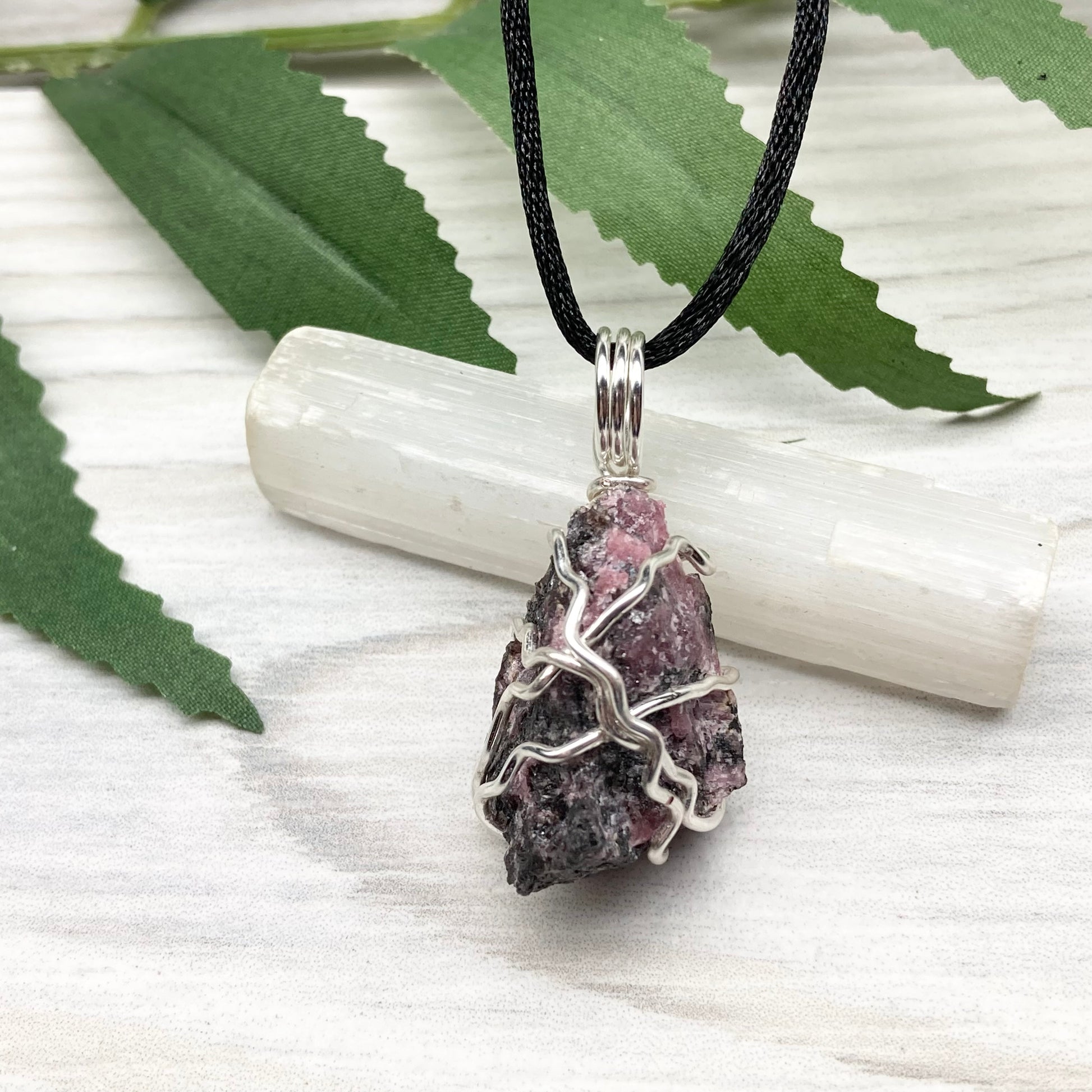 Rhodonite necklace. Raw Rhodonite wrapped with silver copper wire. Comes on a black chain. Black and pink crystal pendant. Wire wrapped stone jewelry. Taurus zodiac gift.