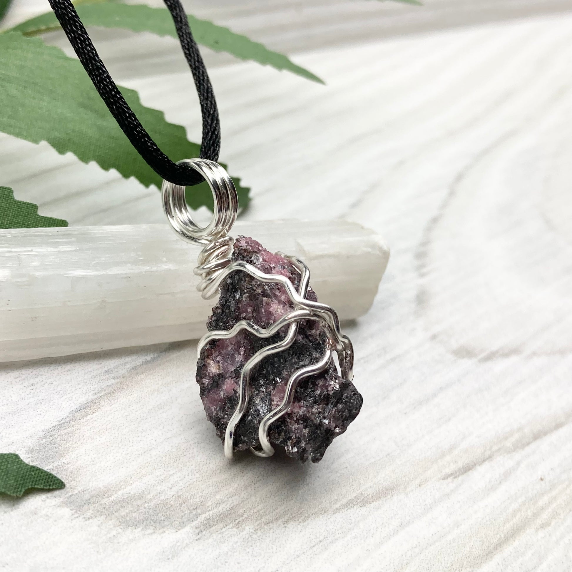 Rhodonite necklace. Raw Rhodonite wrapped with silver copper wire. Comes on a black chain. Black and pink crystal pendant. Wire wrapped stone jewelry. Taurus zodiac gift.
