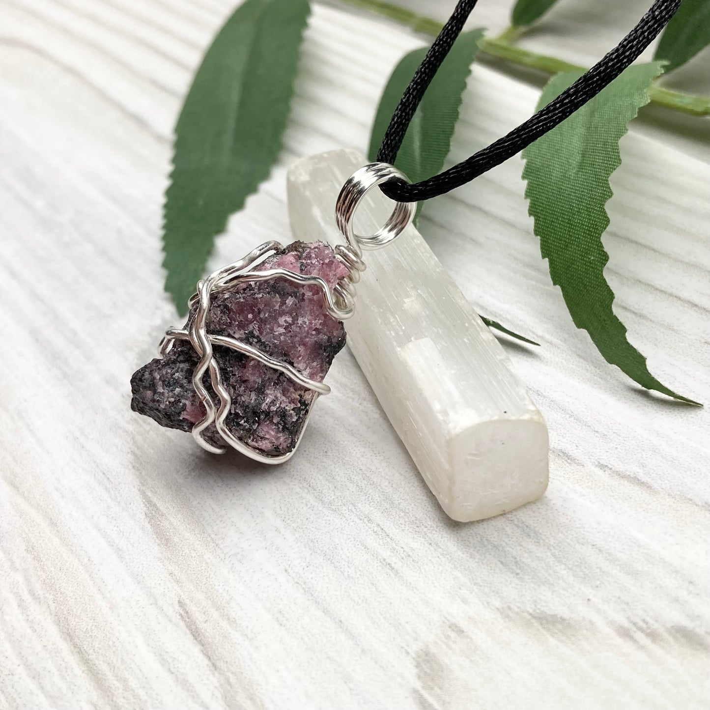 Rhodonite necklace. Raw Rhodonite wrapped with silver copper wire. Comes on a black chain. Black and pink crystal pendant. Wire wrapped stone jewelry. Taurus zodiac gift.