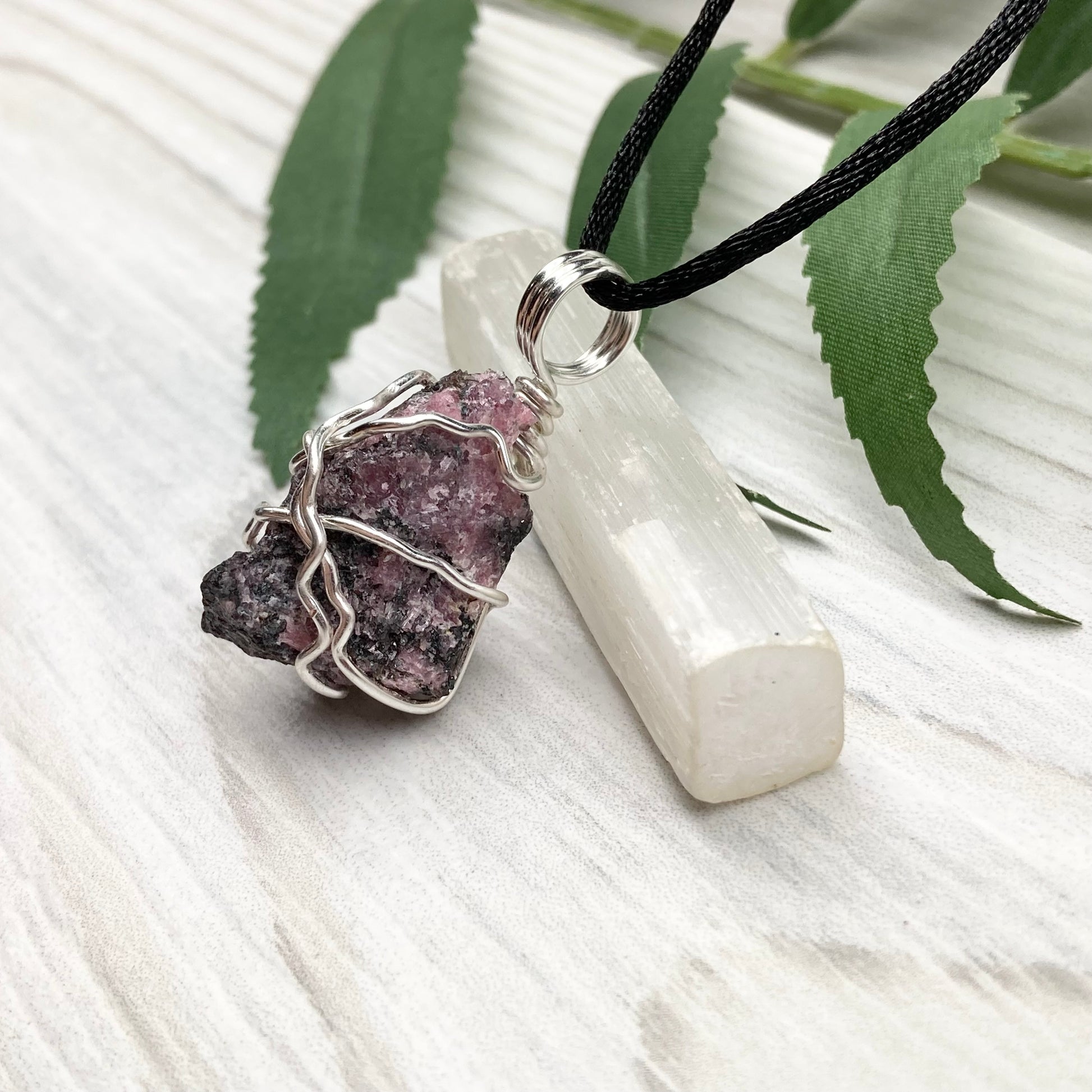Rhodonite necklace. Raw Rhodonite wrapped with silver copper wire. Comes on a black chain. Black and pink crystal pendant. Wire wrapped stone jewelry. Taurus zodiac gift.