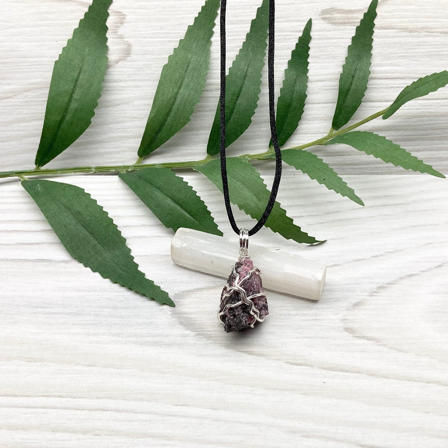 Rhodonite necklace. Raw Rhodonite wrapped with silver copper wire. Comes on a black chain. Black and pink crystal pendant. Wire wrapped stone jewelry. Taurus zodiac gift.