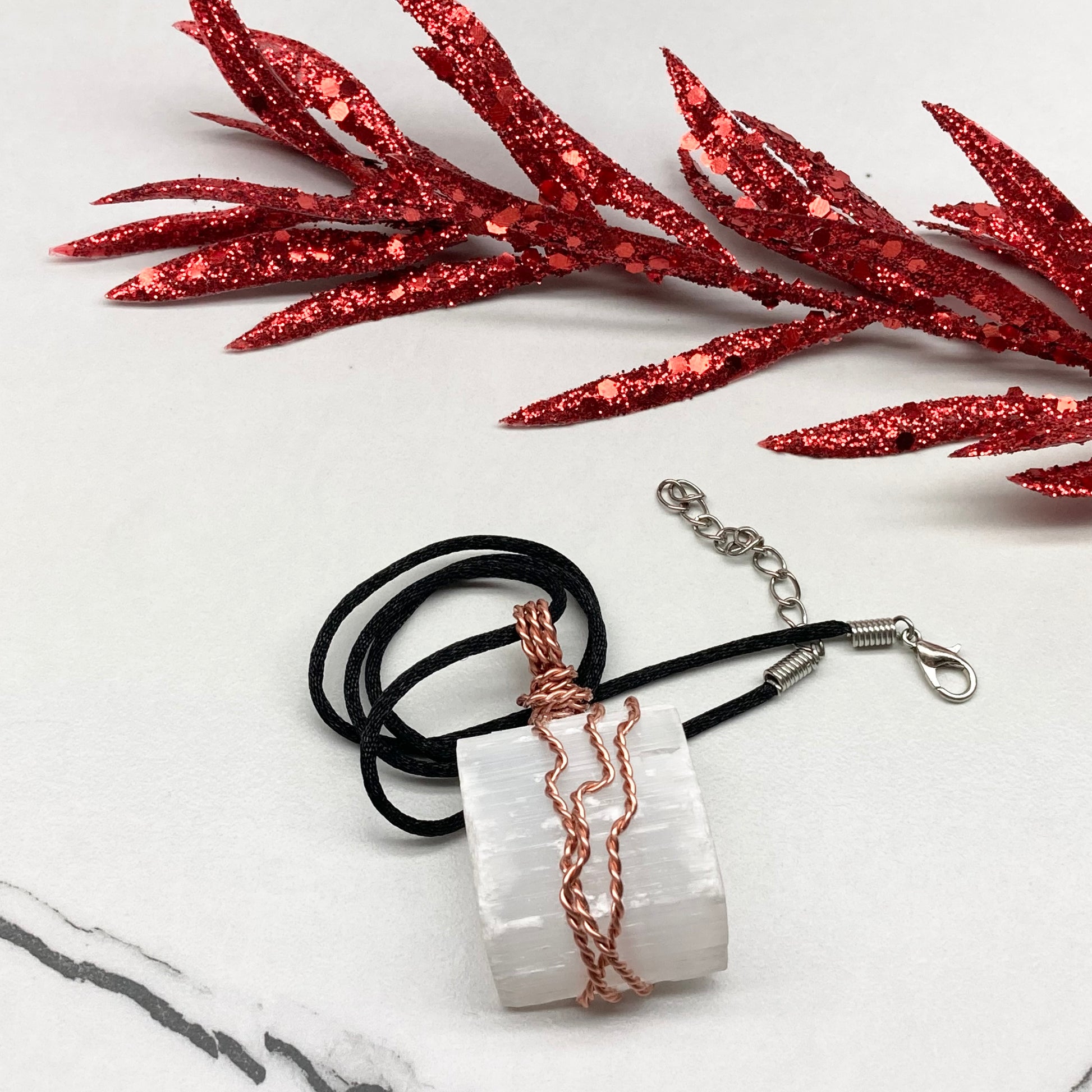 Large chunky Selenite crystal wrapped in 99.9% pure copper wire on a black necklace. Big white stone pendant. Handmade during the Moon in Aries.