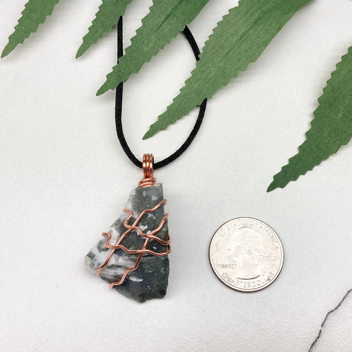 Tree Agate necklace. Green and white stone wrapped with pure copper wire. Hangs on a black chain. Unisex metaphysical jewelry.