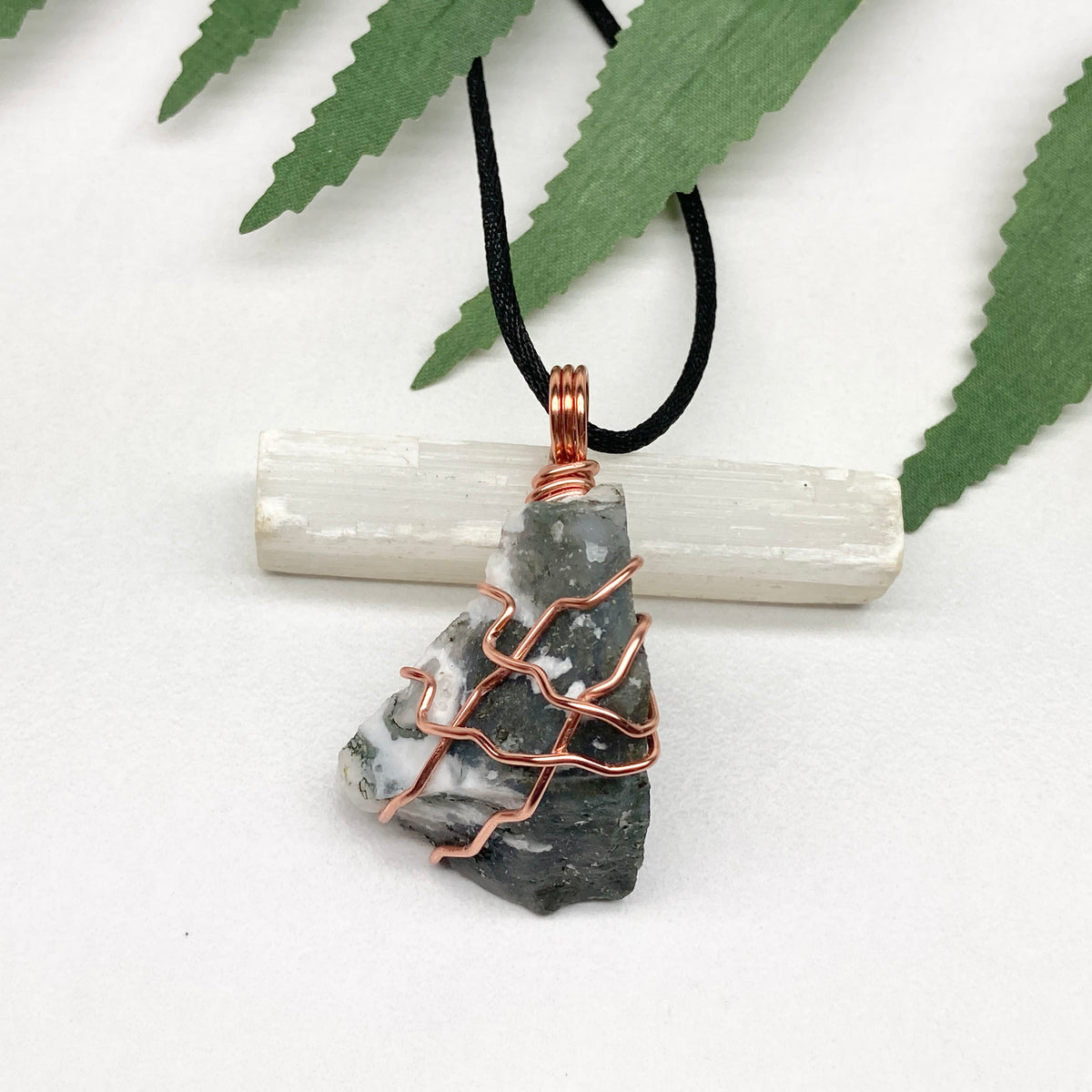 Tree Agate necklace. Green and white stone wrapped with pure copper wire. Hangs on a black chain. Unisex metaphysical jewelry.