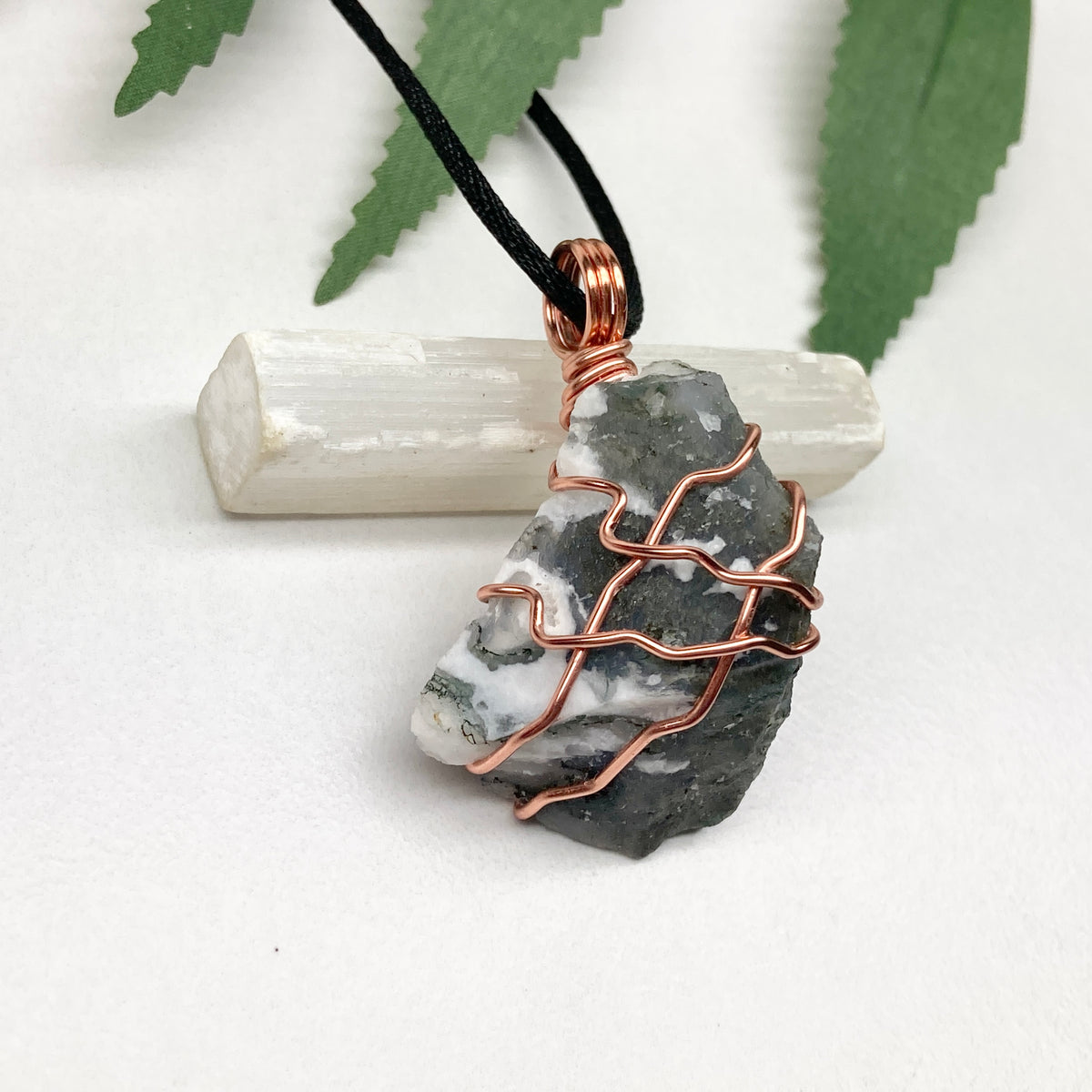 Tree Agate necklace. Green and white stone wrapped with pure copper wire. Hangs on a black chain. Unisex metaphysical jewelry.