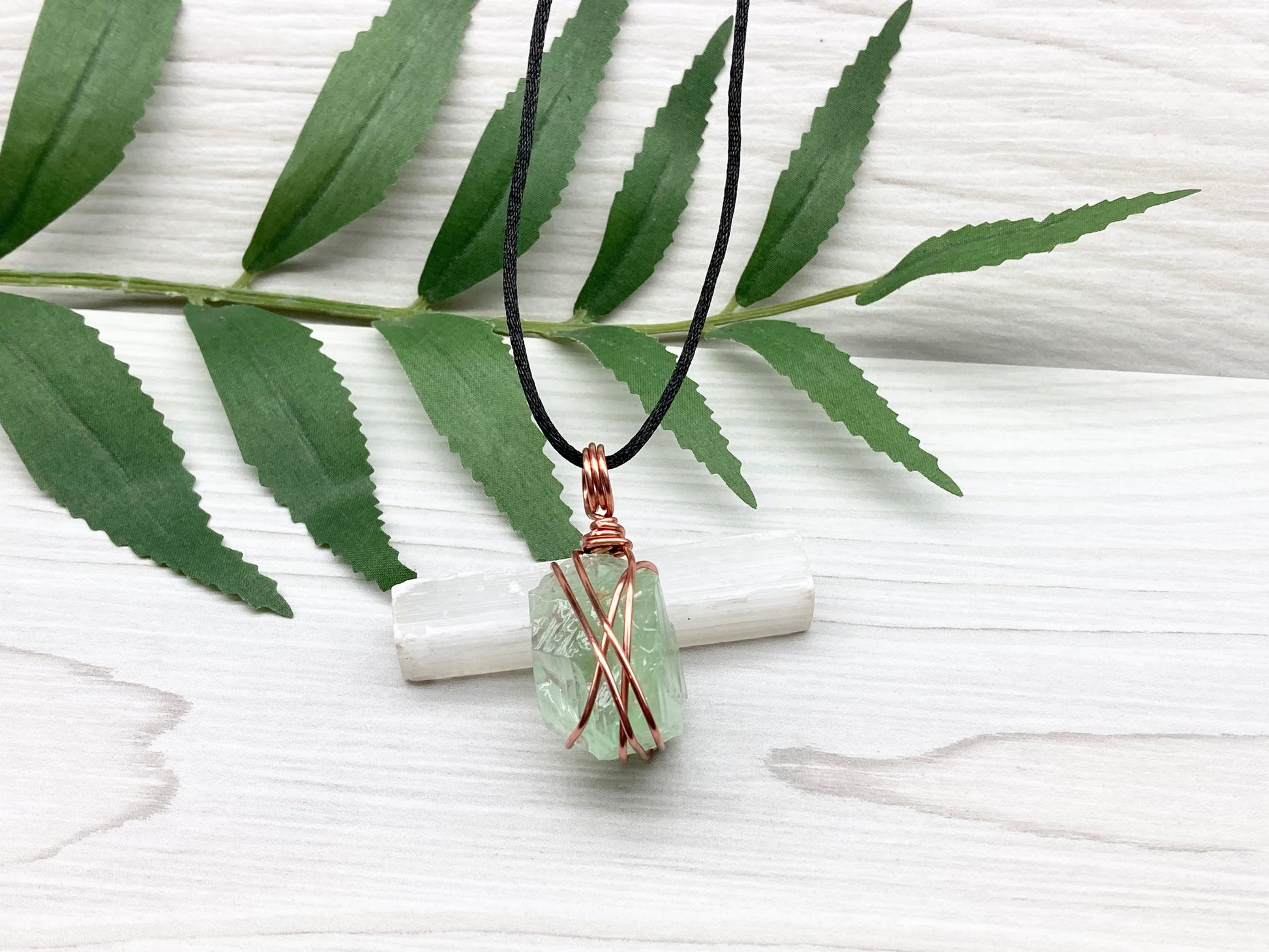Green Calcite Necklace. Copper Wire Wrapped Stone Pendant. Raw Light Green Crystal. Comes On A Black Chain. Hand Crafted Metaphysical Jewelry For Him Or Her.