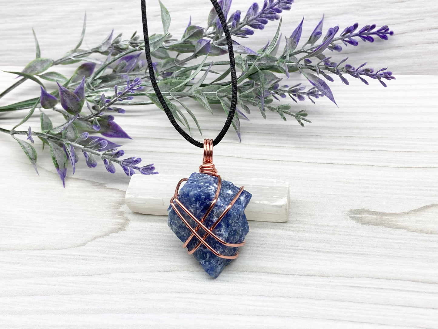 Raw Sodalite Necklace. Real Sodalite Crystal Hand Wrapped With Pure Copper Wire. Gemstone Is Blue With White In It. Comes On A Black Chain. Sagittarius Zodiac Stone Unisex Jewelry.