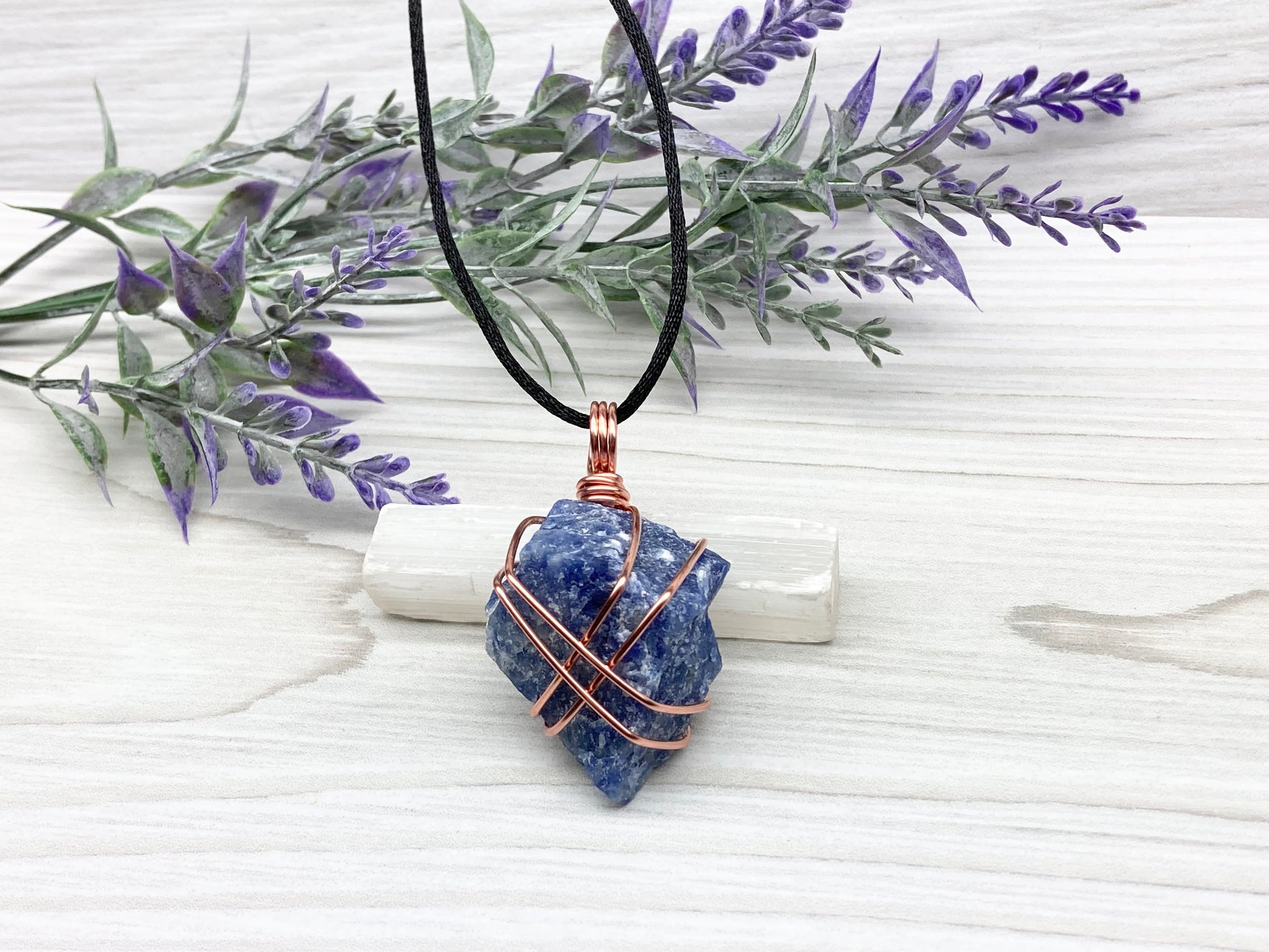 Raw Sodalite Necklace. Real Sodalite Crystal Hand Wrapped With Pure Copper Wire. Gemstone Is Blue With White In It. Comes On A Black Chain. Sagittarius Zodiac Stone Unisex Jewelry.