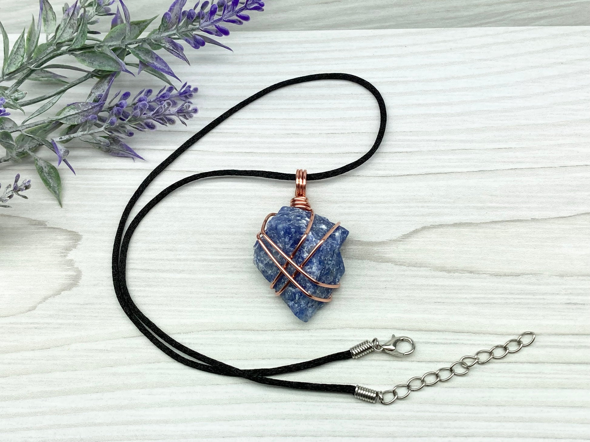 Raw Sodalite Necklace. Real Sodalite Crystal Hand Wrapped With Pure Copper Wire. Gemstone Is Blue With White In It. Comes On A Black Chain. Sagittarius Zodiac Stone Unisex Jewelry.