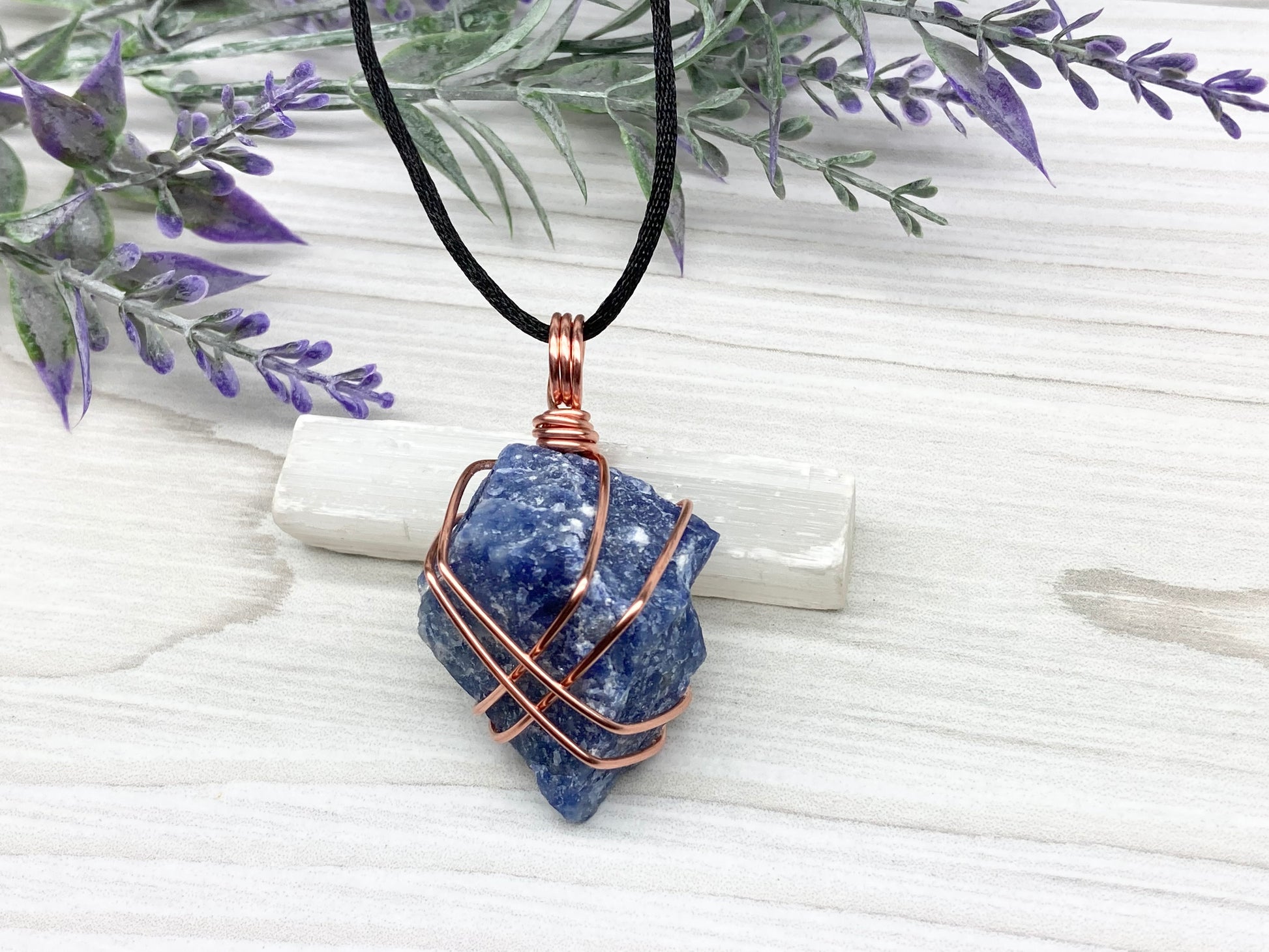 Raw Sodalite Necklace. Real Sodalite Crystal Hand Wrapped With Pure Copper Wire. Gemstone Is Blue With White In It. Comes On A Black Chain. Sagittarius Zodiac Stone Unisex Jewelry.
