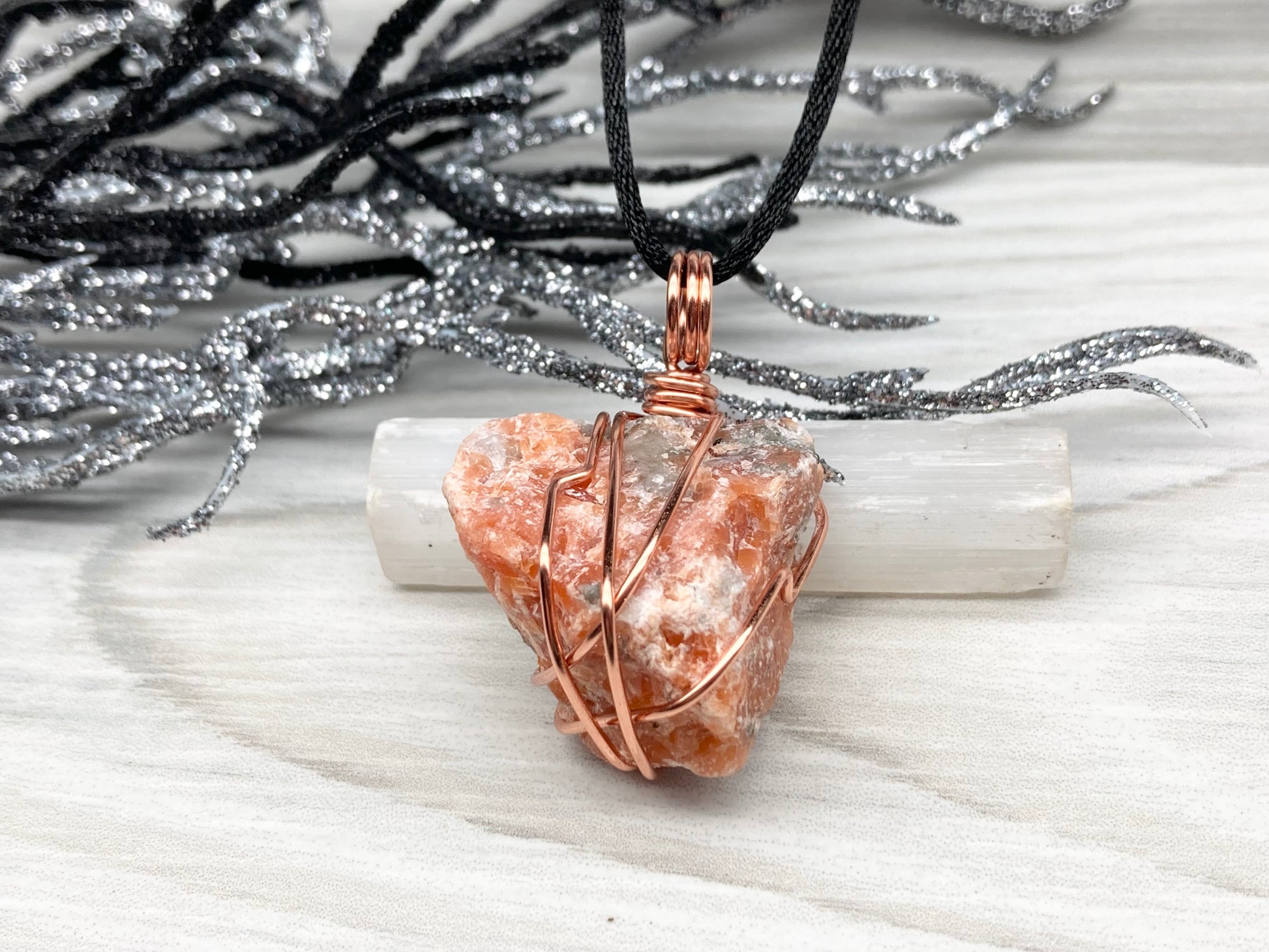 Natural Raw Orange Calcite Crystal Hand Wrapped With Tarnish Resistant Copper Wire. Comes On A Black Chain. Crystal Is Orange With A Bit Of Blue On The Top.Pendant Handcrafted During The Moon In Sagittarius. New Age Style Jewelry.