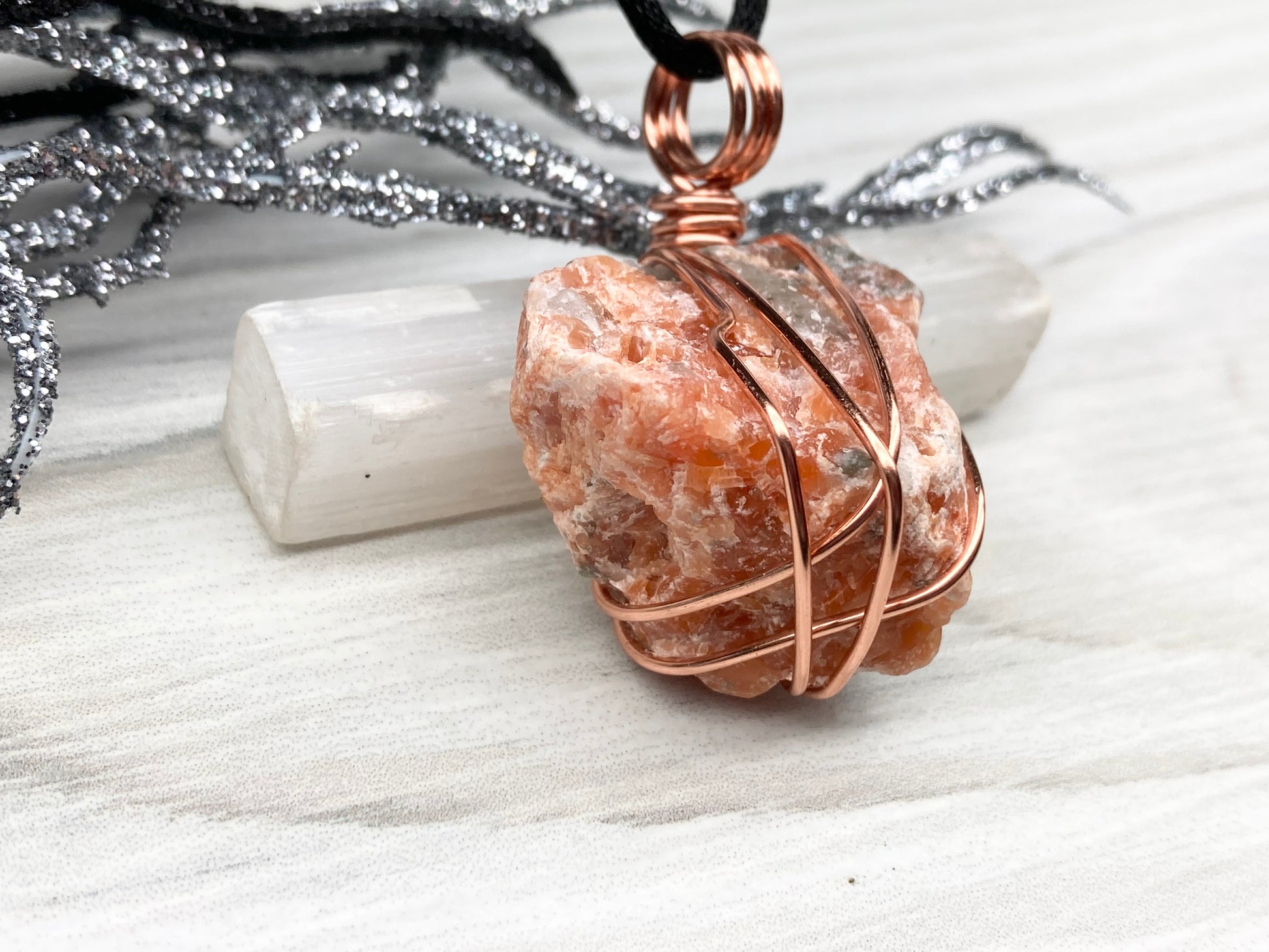 Natural Raw Orange Calcite Crystal Hand Wrapped With Tarnish Resistant Copper Wire. Comes On A Black Chain. Crystal Is Orange With A Bit Of Blue On The Top.Pendant Handcrafted During The Moon In Sagittarius. New Age Style Jewelry.